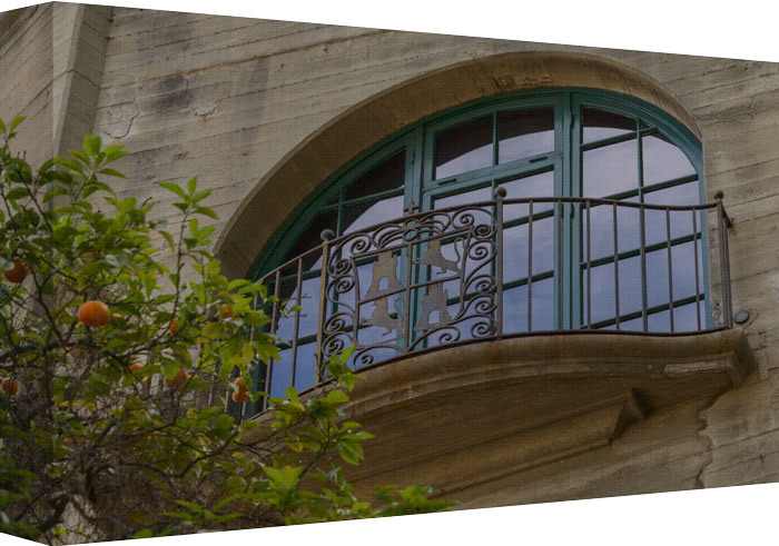 This terrace view includes morning fresh oranges served up just outside your private balcony.