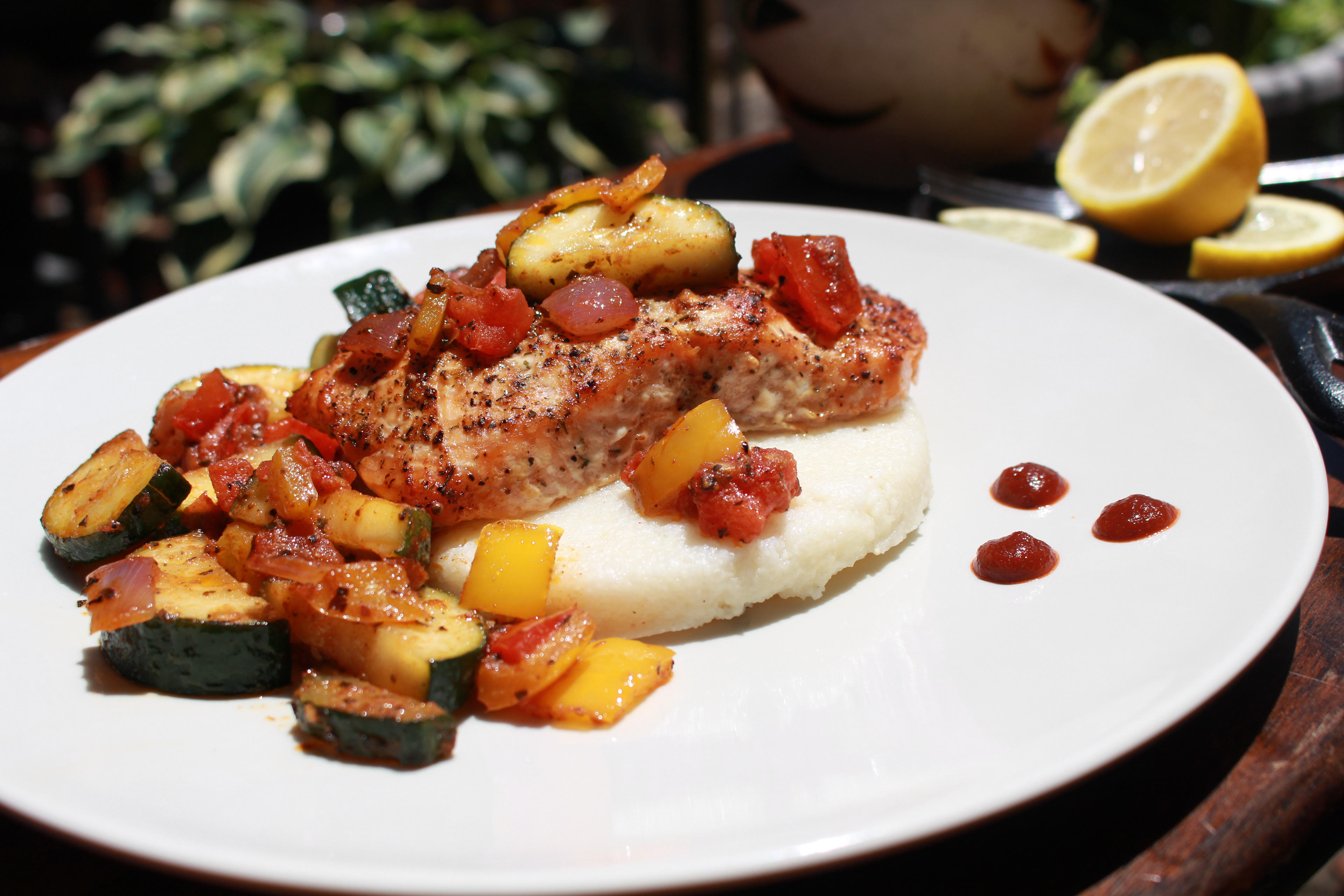 Cajun Salmon over grit cakes