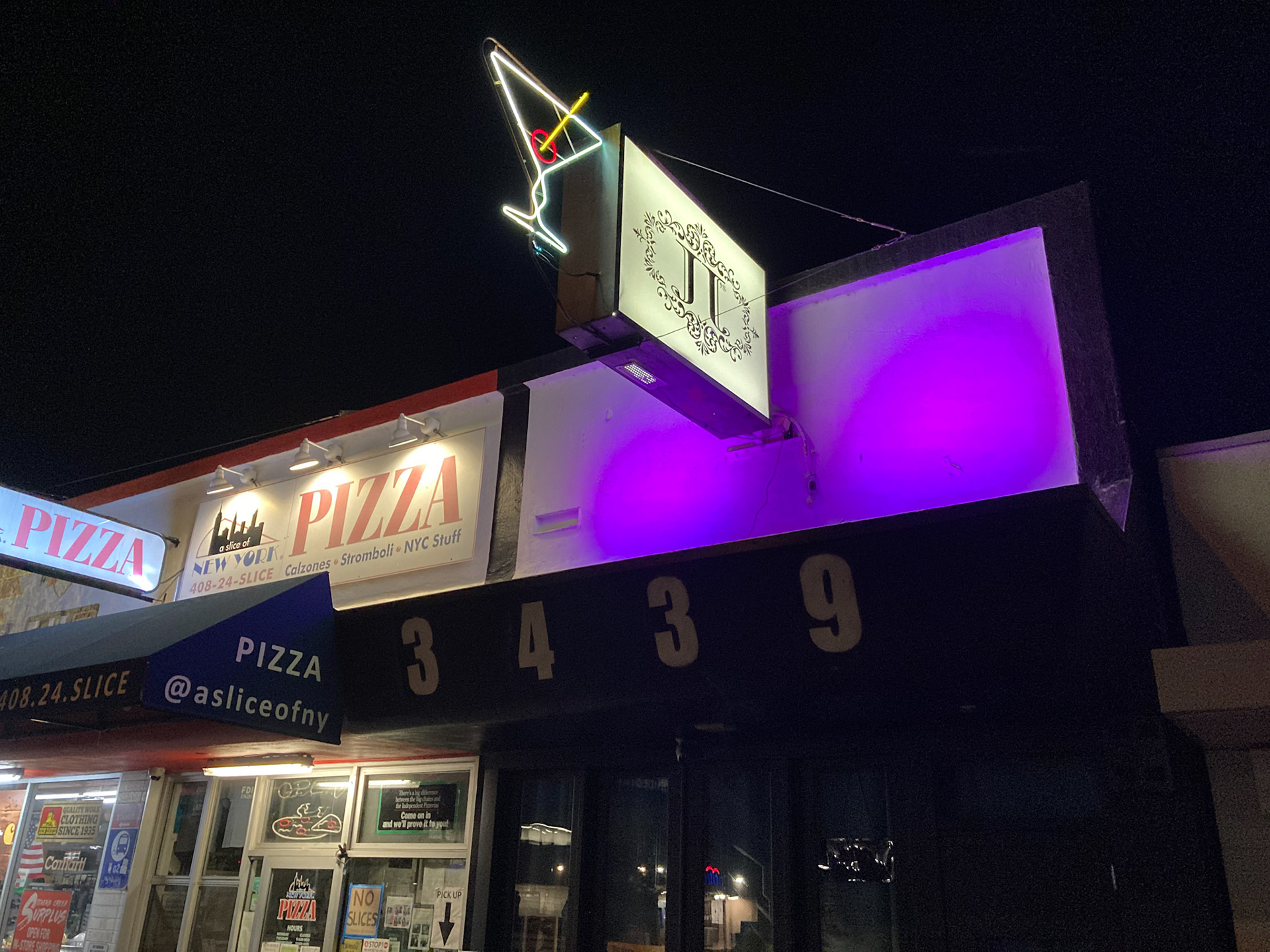 New York Pizza by the Slice next to JJ’s Blues Live Music Lounge