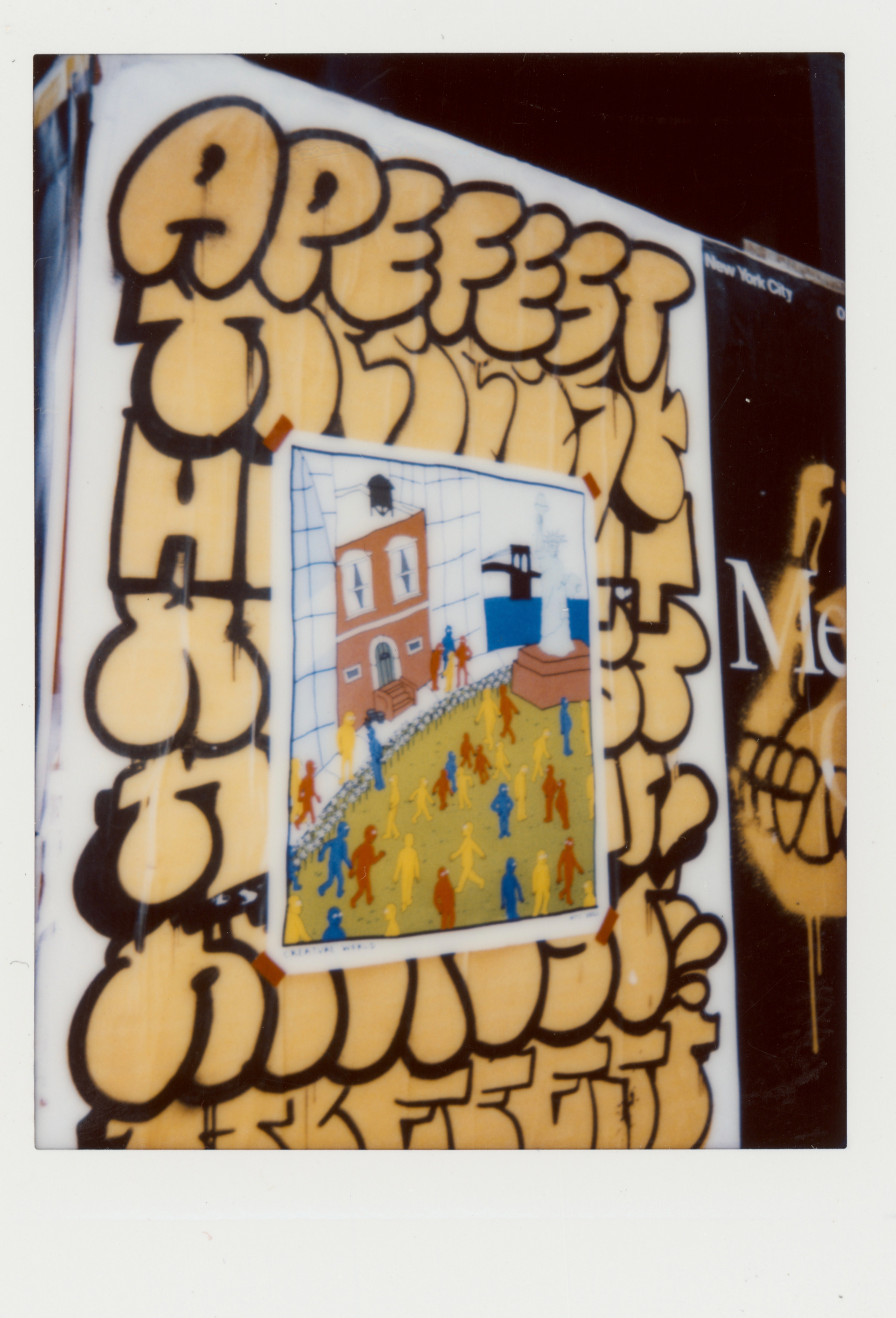 Mini Instax photo of Apefest poster with street art over it