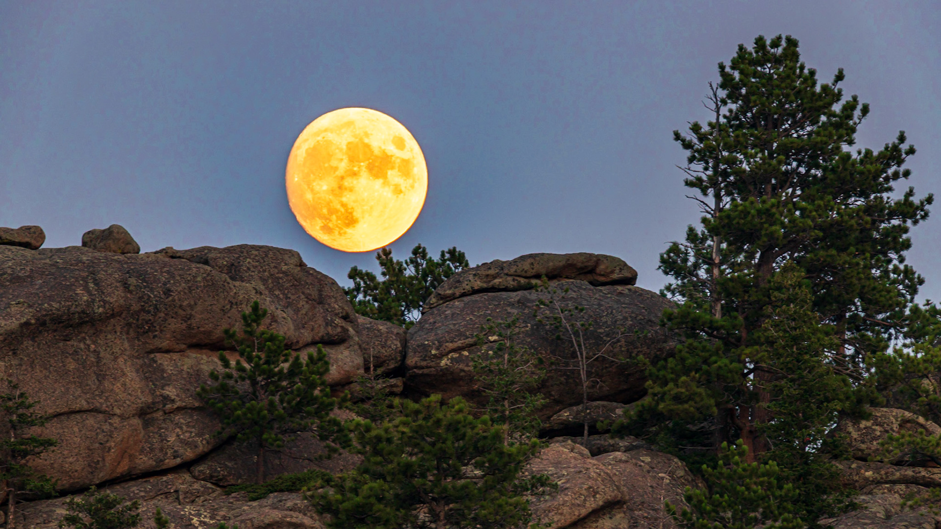 Full moonrise over rocks