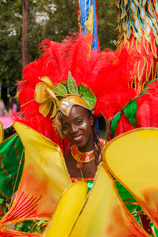 Dancer in feather costume Sefton Park Liverpool