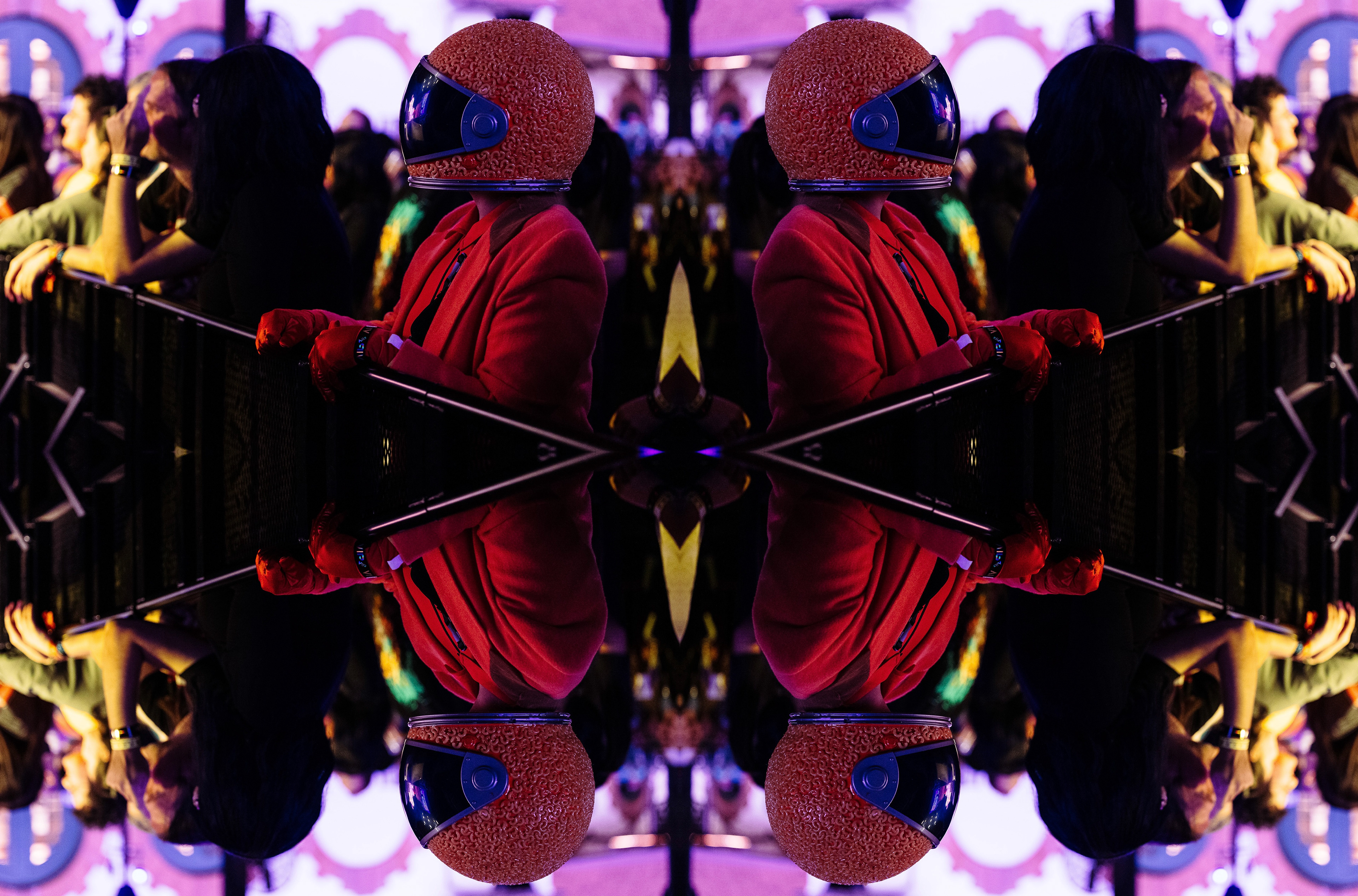 abstract mirrored concert light pattern in red and purple, San Antonio concert photographer Chris Stokes