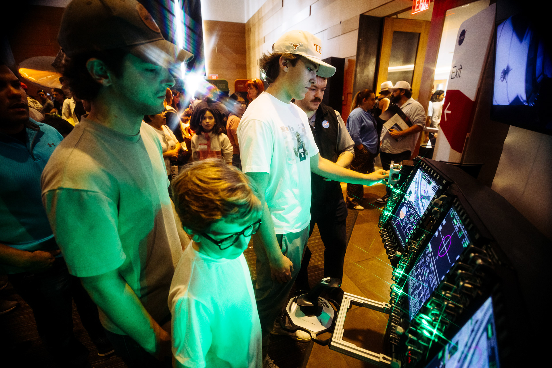 Visitors trying an interactive display at an event