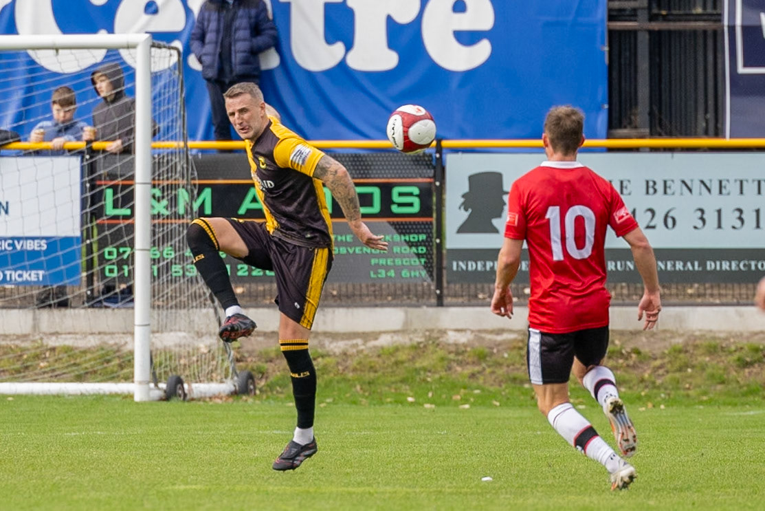 Prescot, ENGLAND -  during the NPL Premier Division match between Prescot Cables and  FC United  at The Auto Safety Centre StadiumCanon Canon EOS R3 640 1/2500 2.8 (Pic by John Middleton)