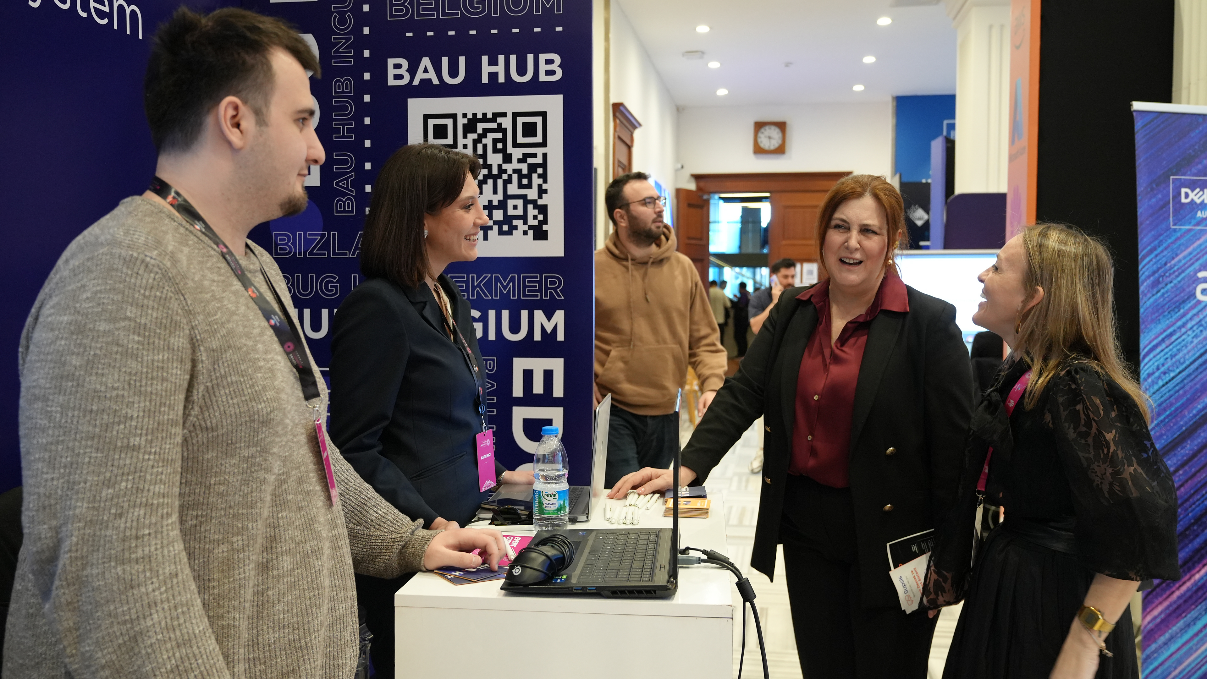 Conversations in the exhibition area, Future AI Summit 2025.