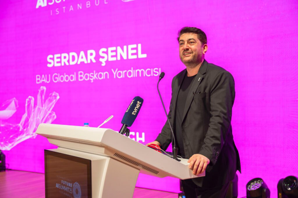 Serdar Şenel speaking at Future AI Summit 2025.