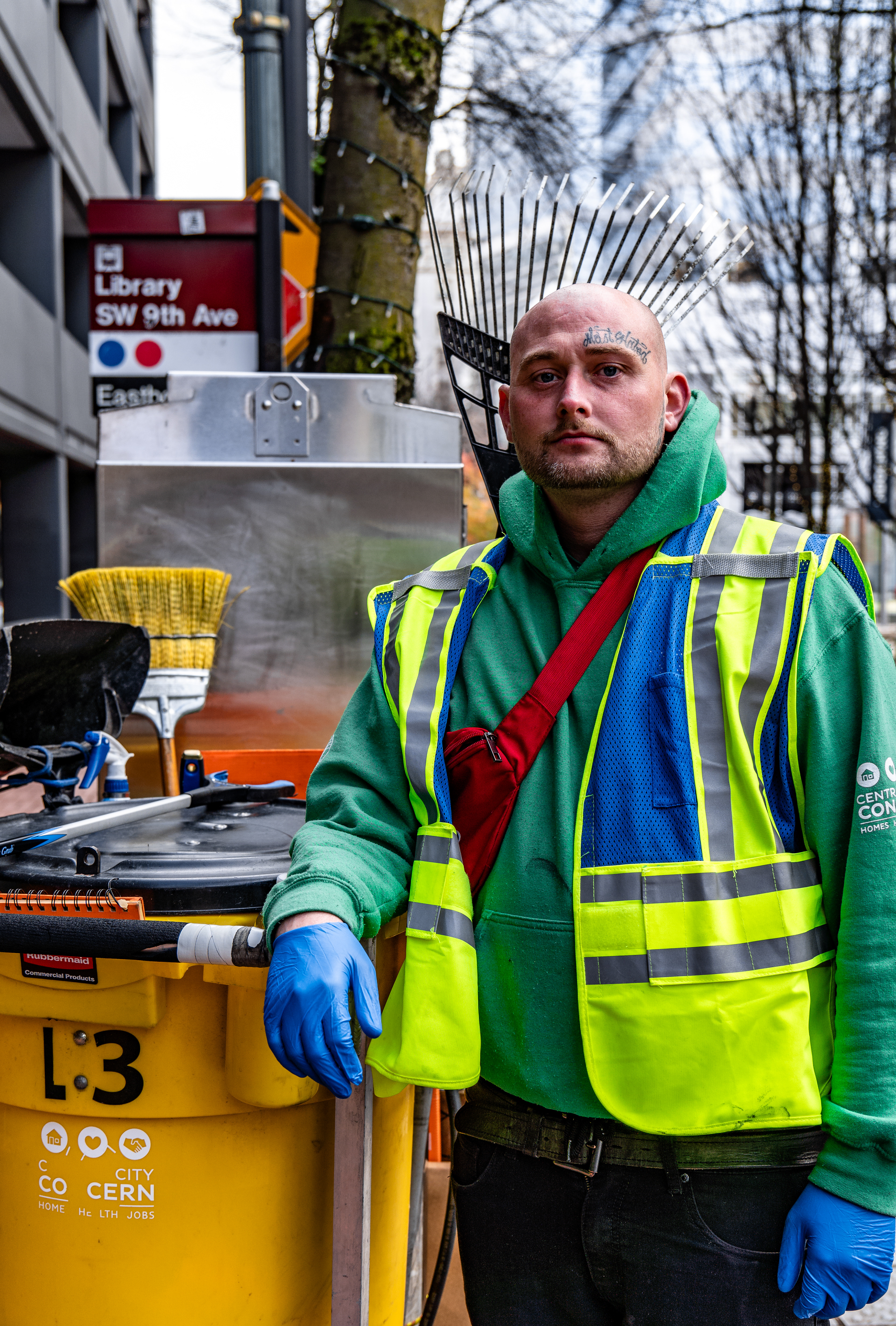 Joseph Smith works for Multnomah County Sanitation. People like Joeseph are the reason cities stay clean. He takes a short break from cleaning the ticket booth to pose for the camera.