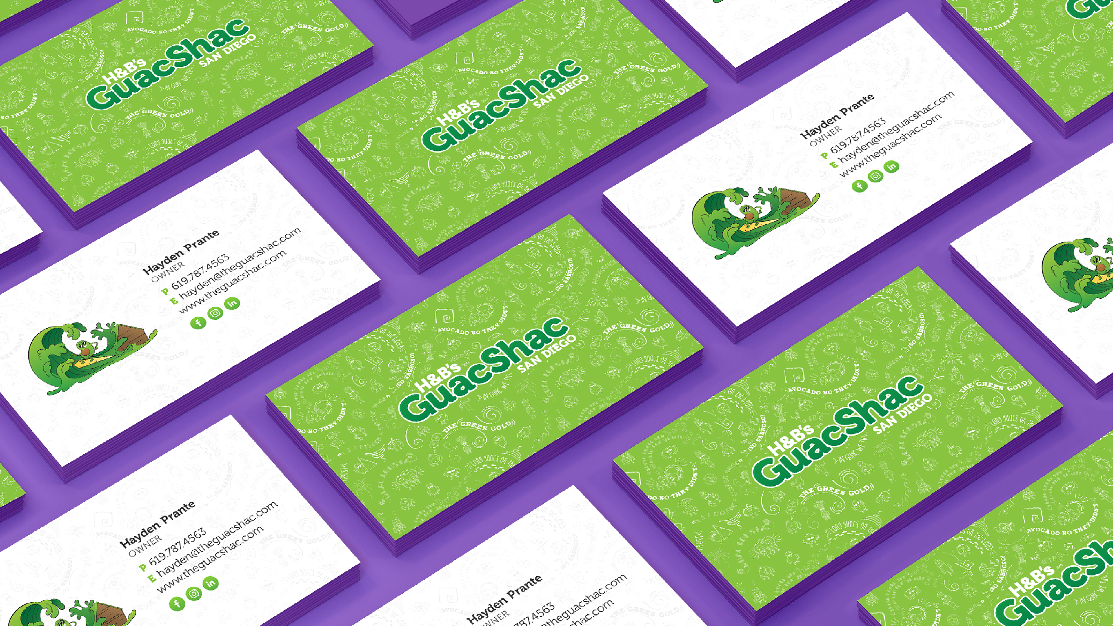 Bright green business cards on a purple background. (designs by Kat Vochoska).