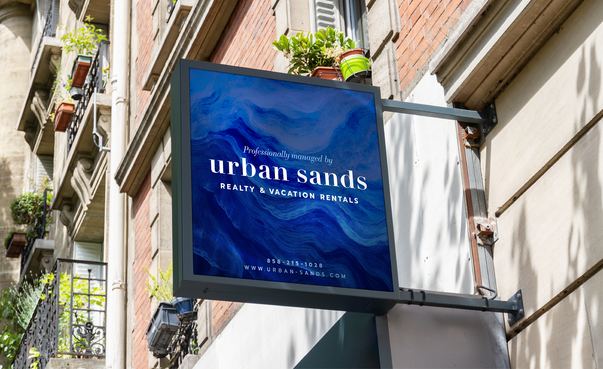 Urban Sands business sign featured outside their office and on some of their properties (designs by Kat Vochoska).