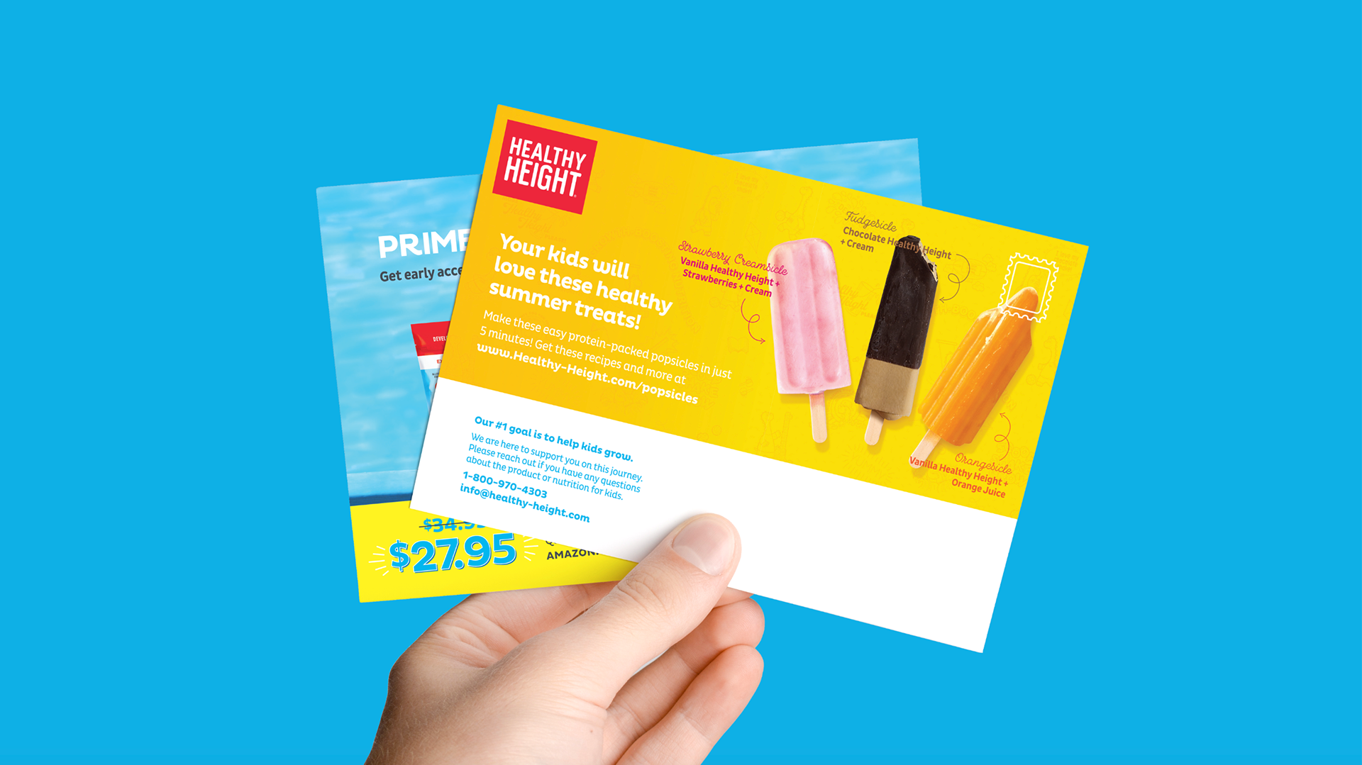 Photo of a hand holding two marketing mailers, one containing 3 different popsicle flavors (designs by Kat Vochoska).