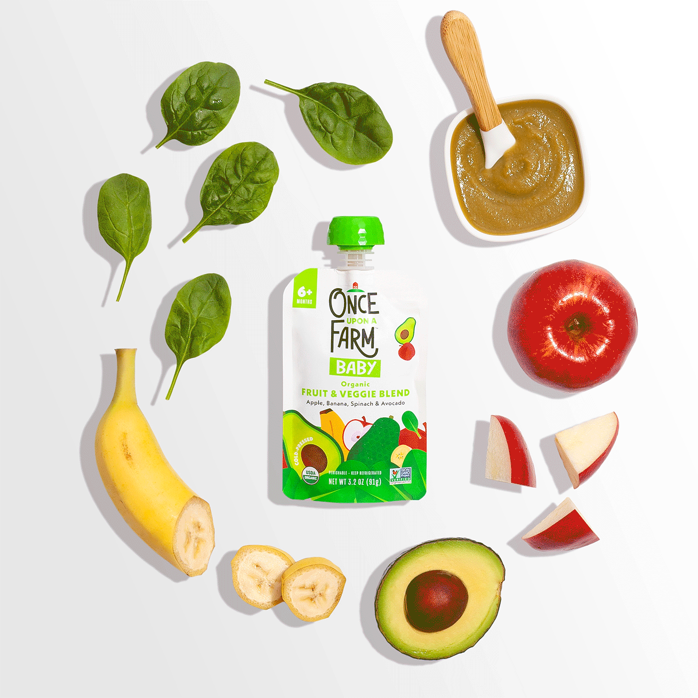 Baby food product surrounded by fruit and vegetable ingredients, all animated hovering on a white background (animation by Kat Vochoska).