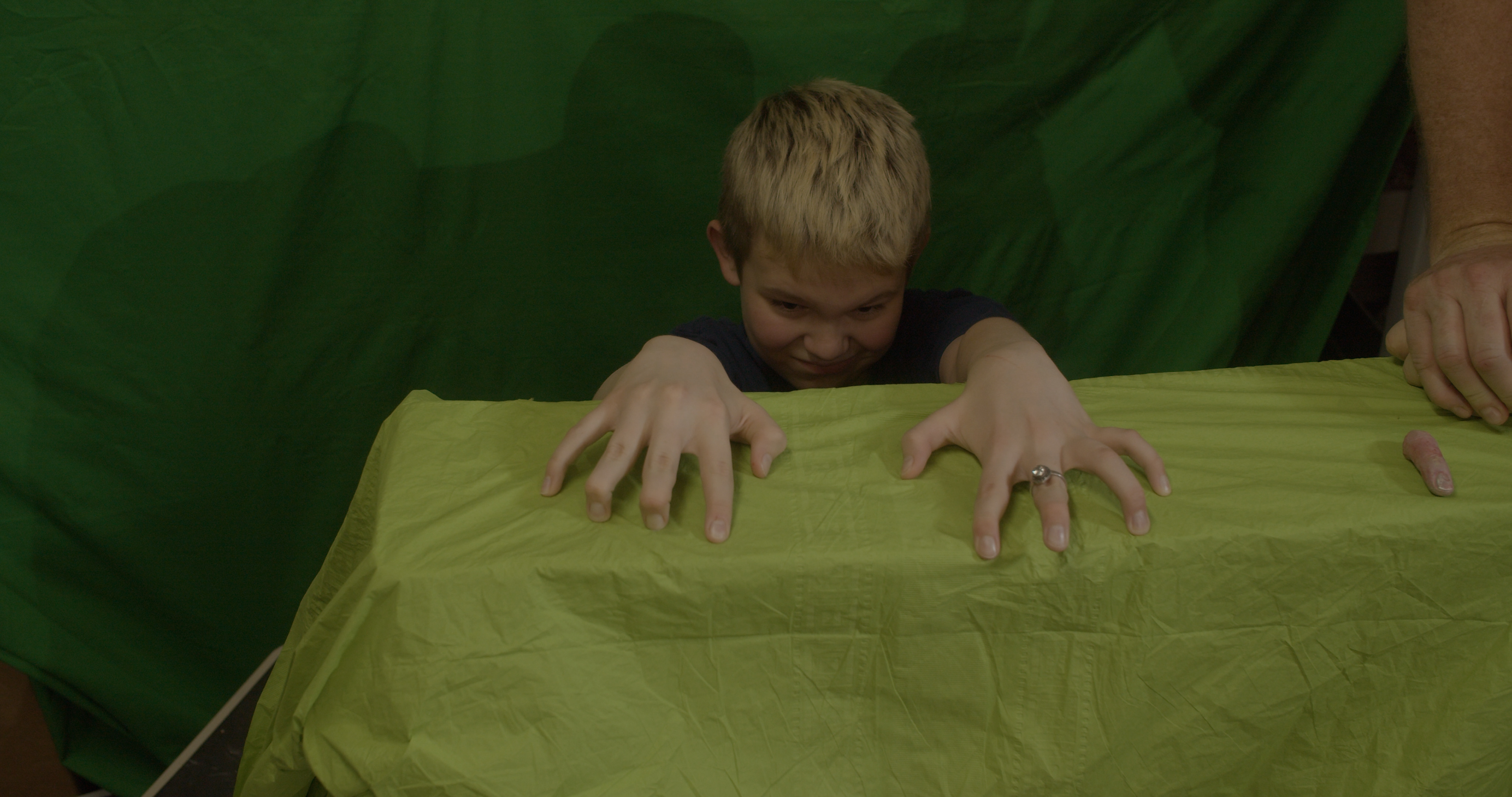 My son plays hand model.