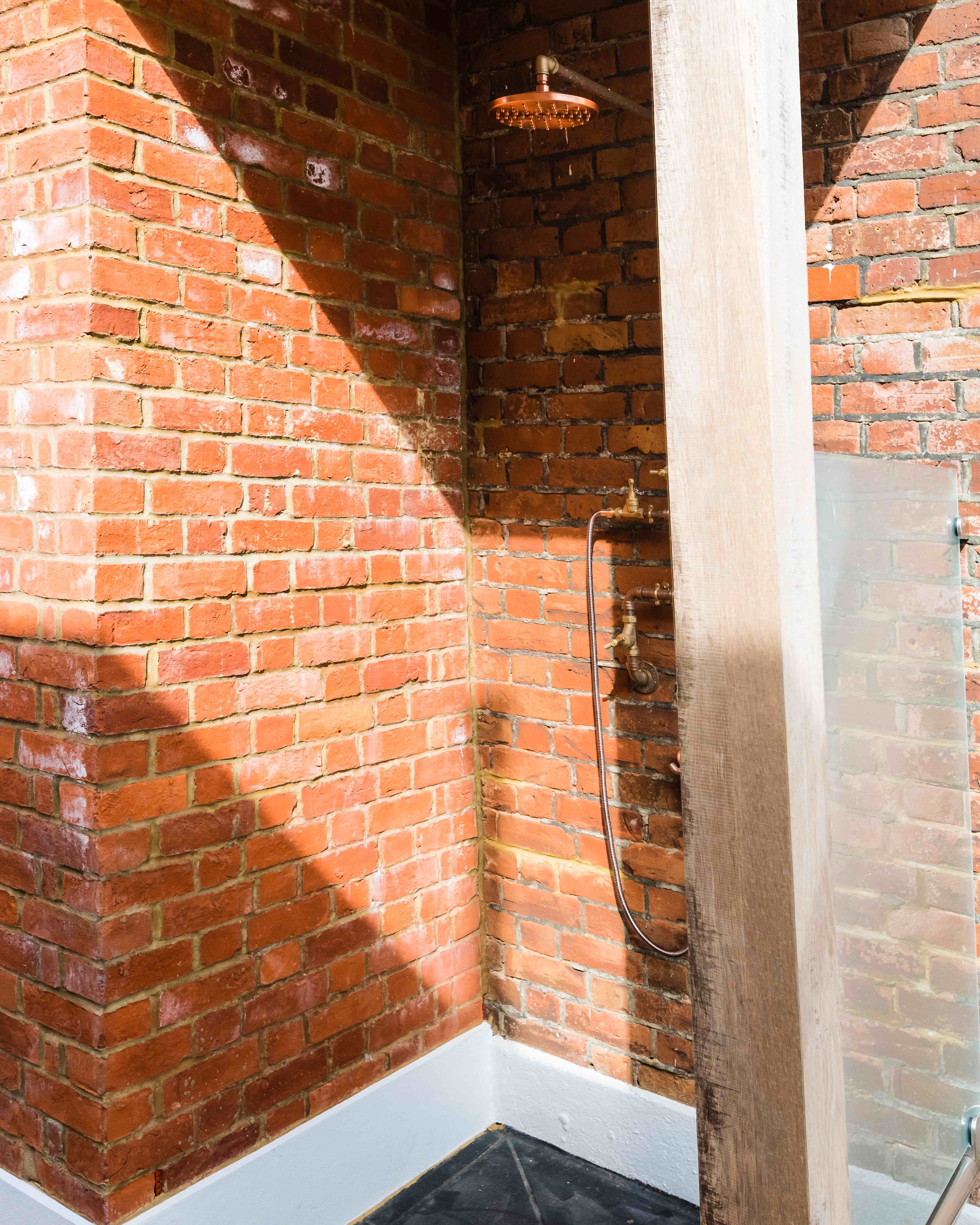 Rinse off the salt and sand under the artisanal copper outdoor shower after a day at the beach