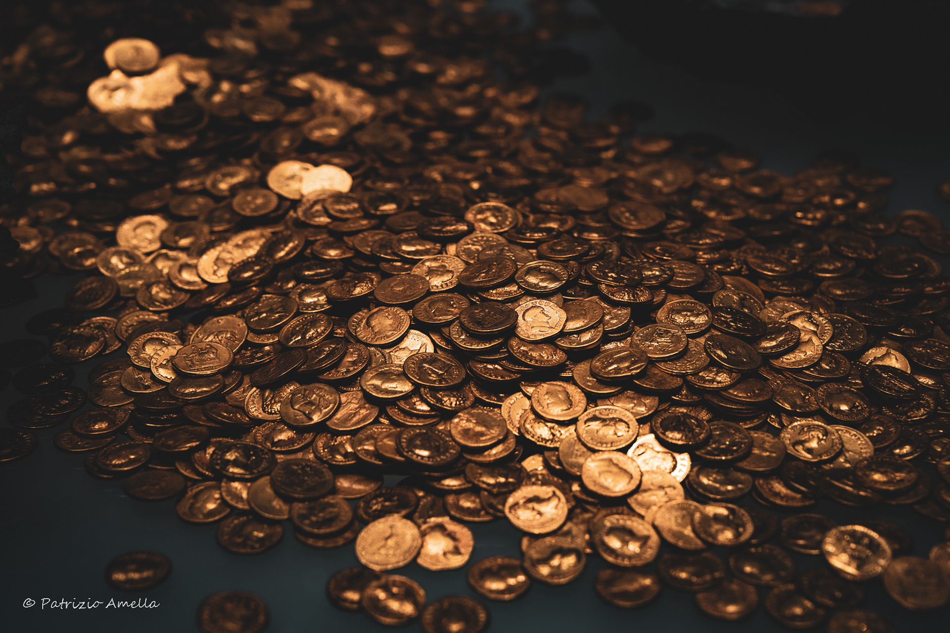 Antique faces on ancient gold