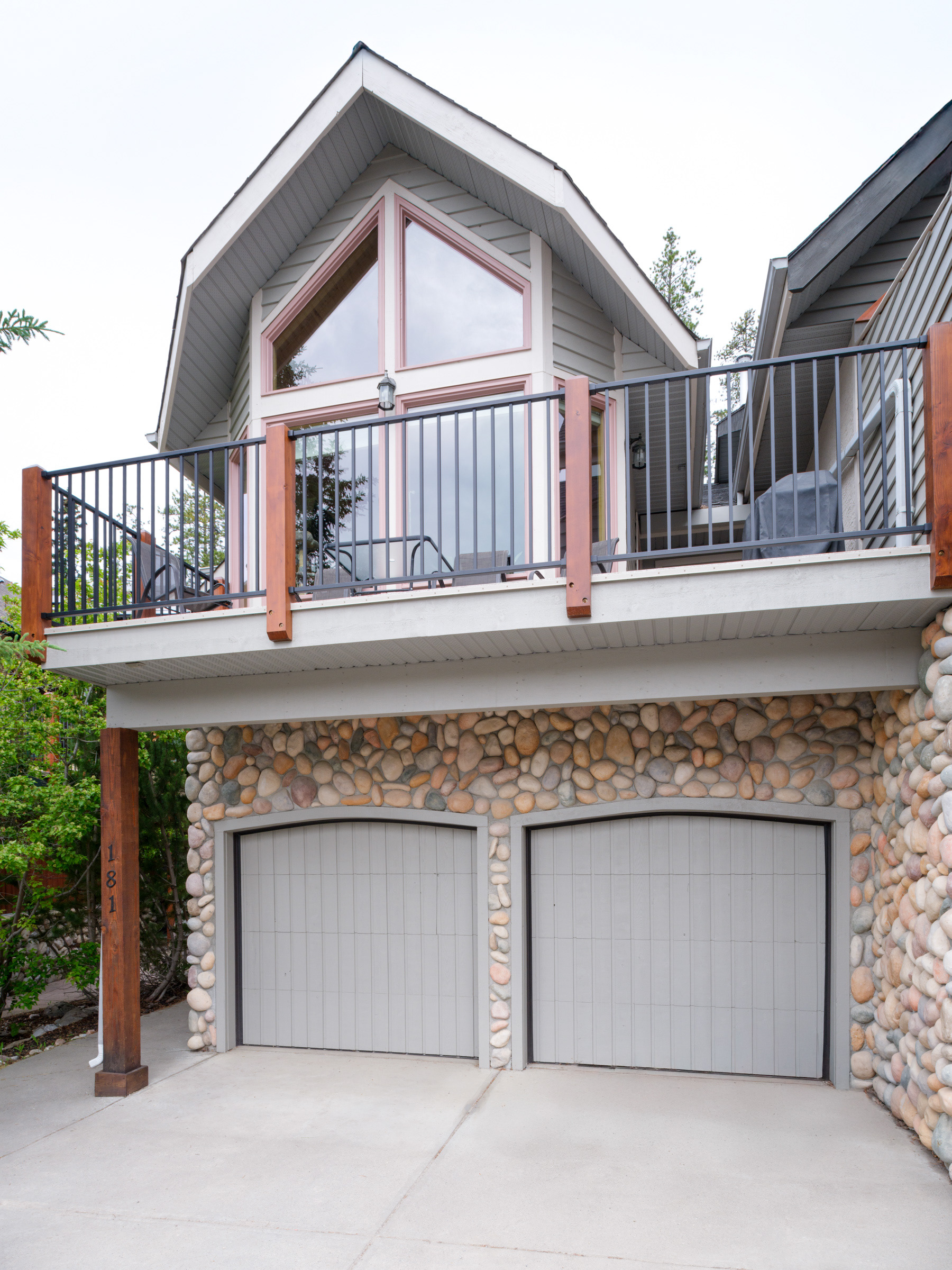 Professionally painted exterior of a residential home in Canmore, Alberta