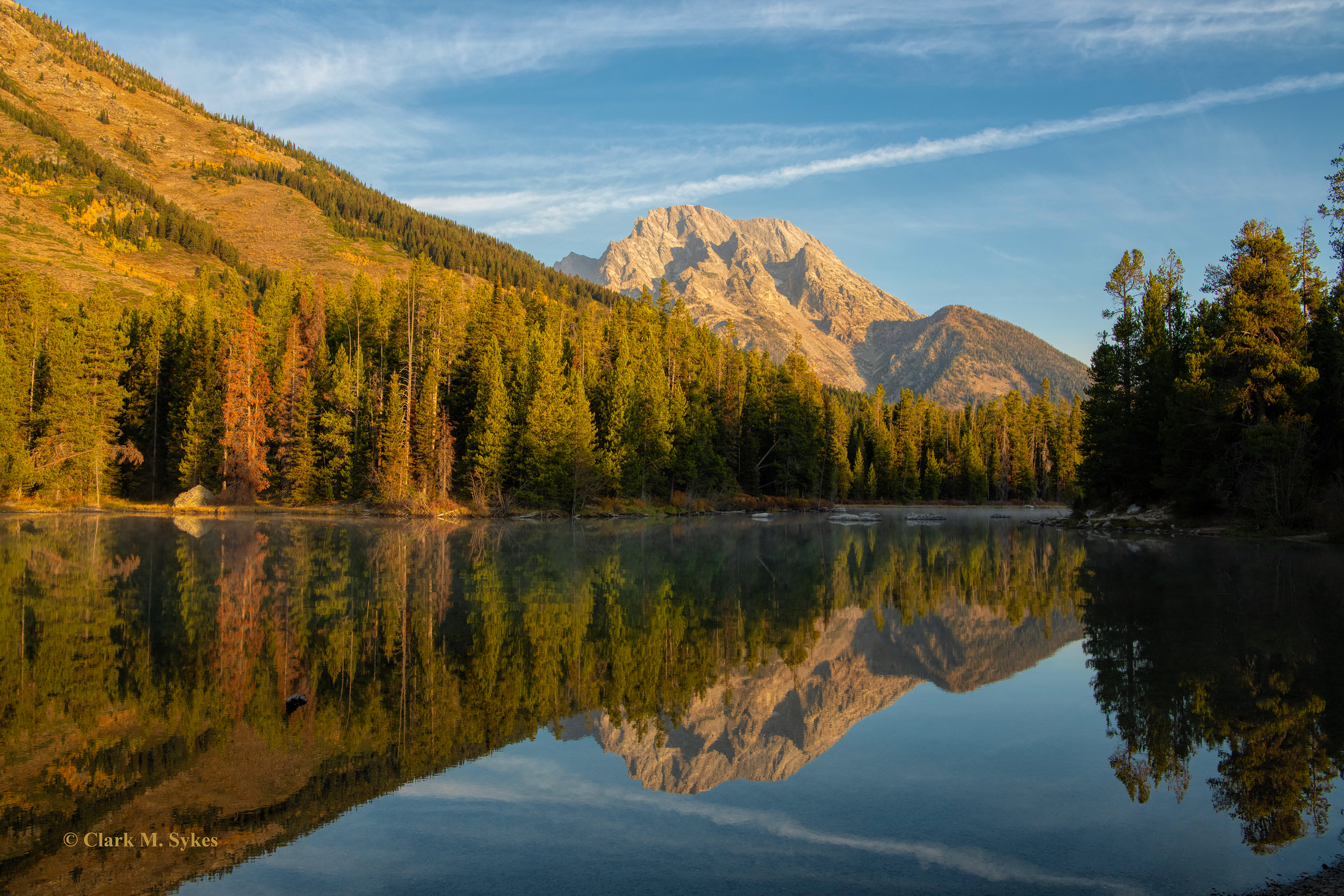 My version of a quintessential Chamber of Commerce scene from String Lake, in the Tetons. Just moments after I took this, a canoeist paddled by, totally disrupting the reflection, but what a sense of peace it was anyway on a sunny fall afternoon.