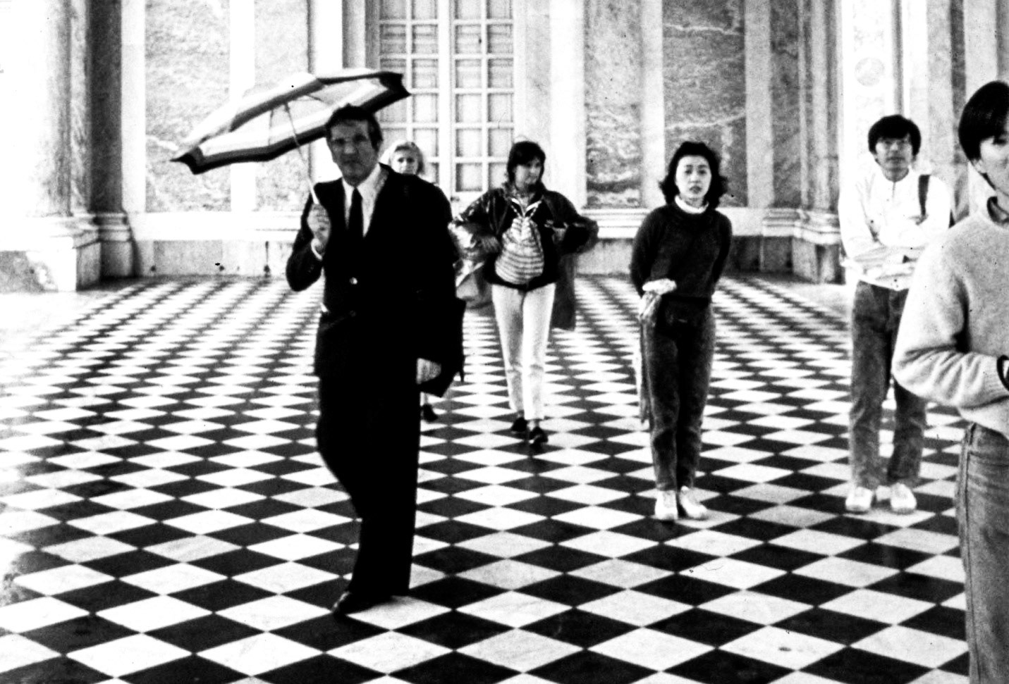 Man in Black Suit Umbrella @ Versailles