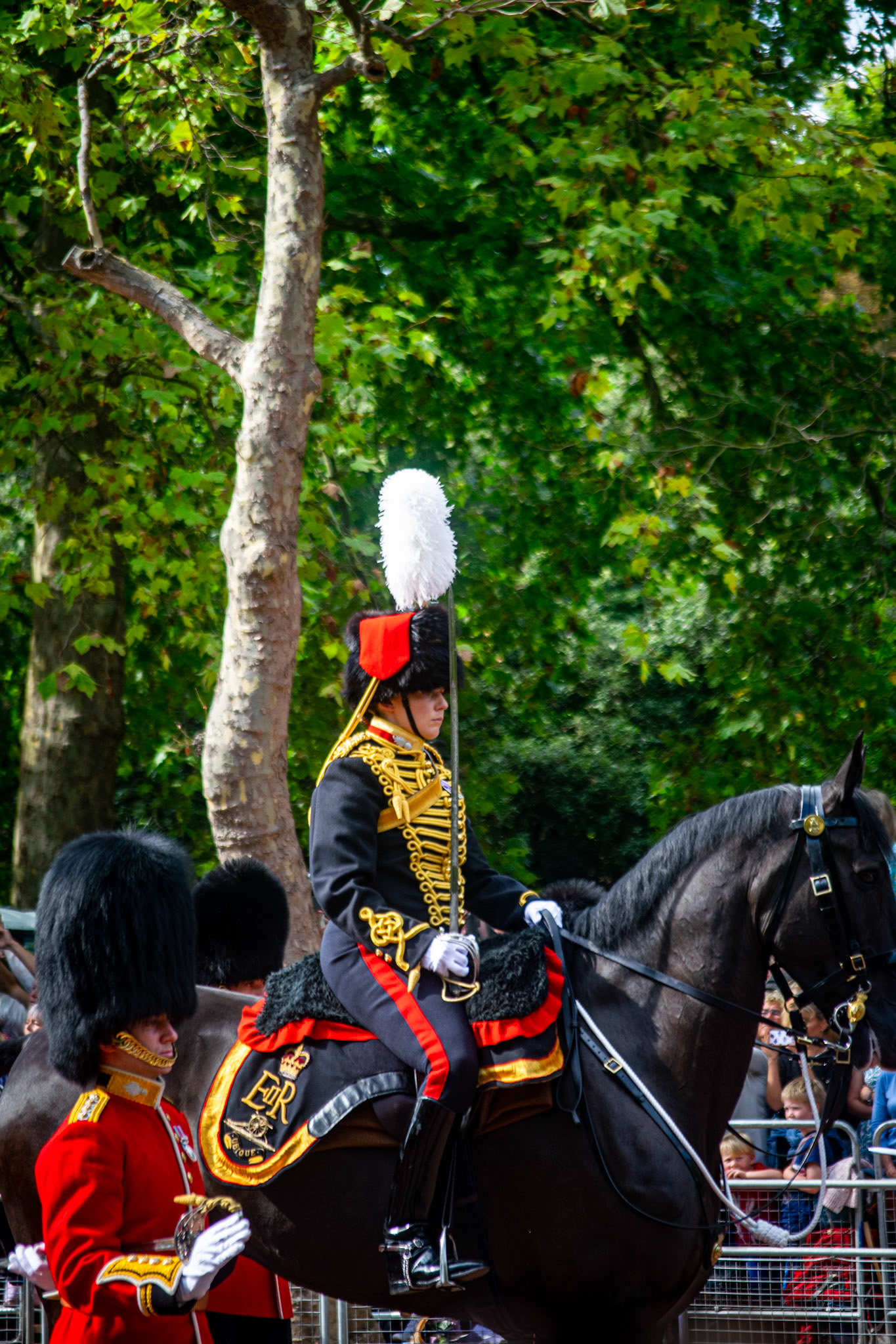 Captain Amy Cooper riding on the veteran horse Lord Firebrand led the procession to the King's Troop Royal Horse Artillery. Seven black horses drew the gun carriage carrying the queen's coffin.
