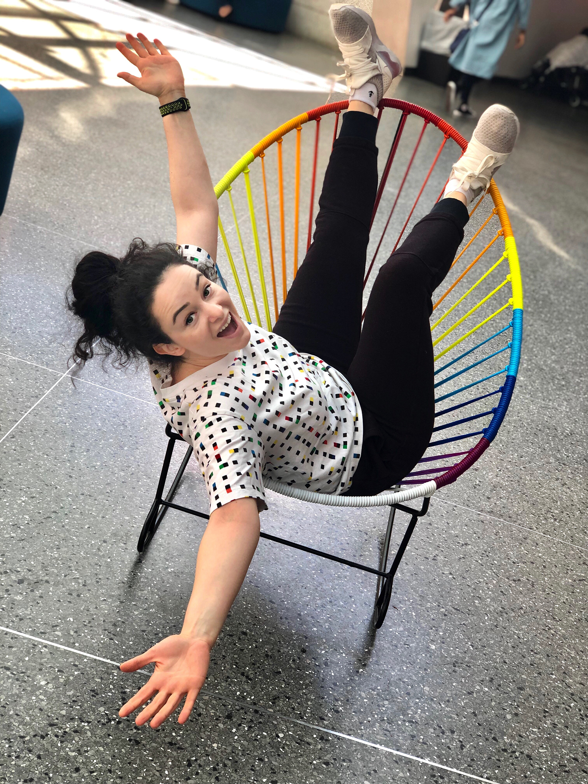 me, being my usual self, sitting upside down in a kiddy chair at the Brooklyn Museum