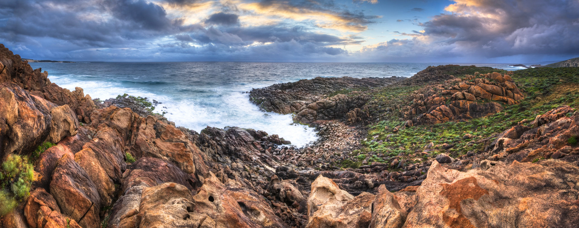 High dynamic range panorama of the sea and rocks at Injadup, Western Australia.