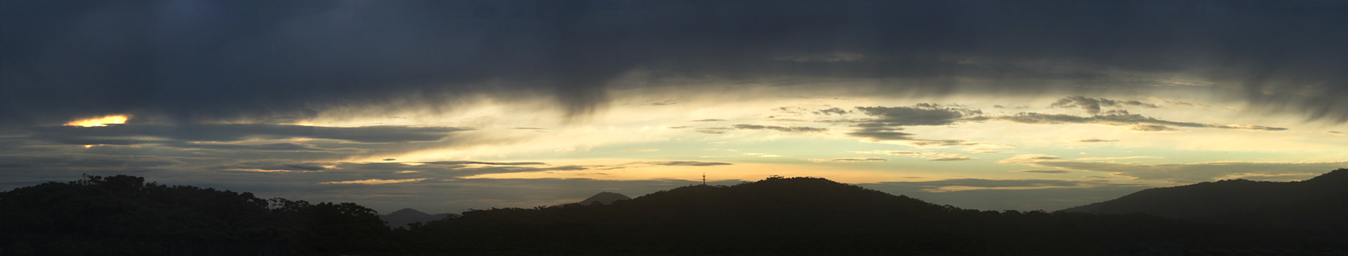 Sunset mountains clouds and sky, taken from our balcony, Bluey's Beach,
