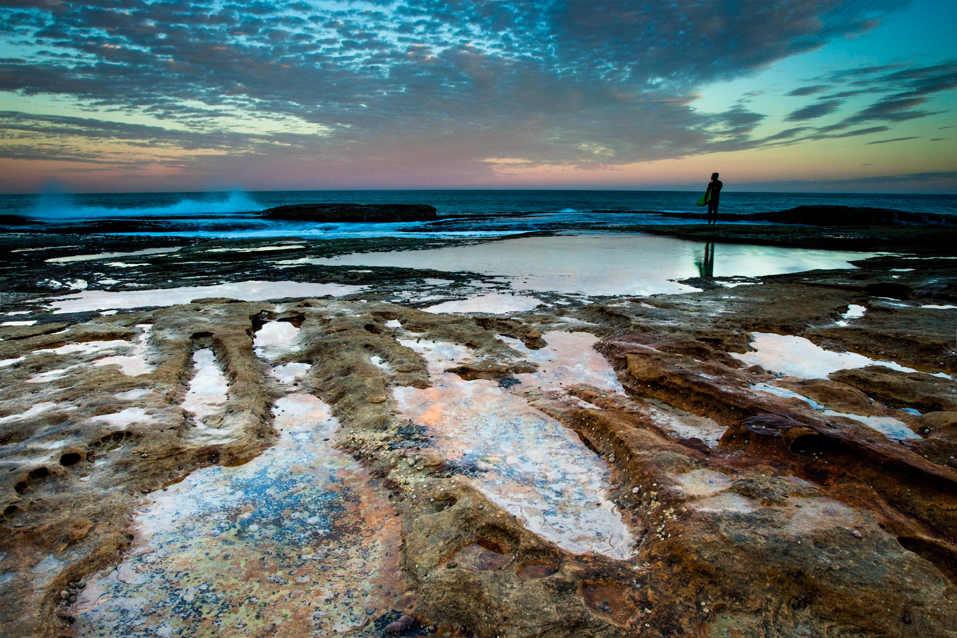 Pondering the surf, from the rocks between Bronte Beach and Mackenzie's Bay, Sydney.