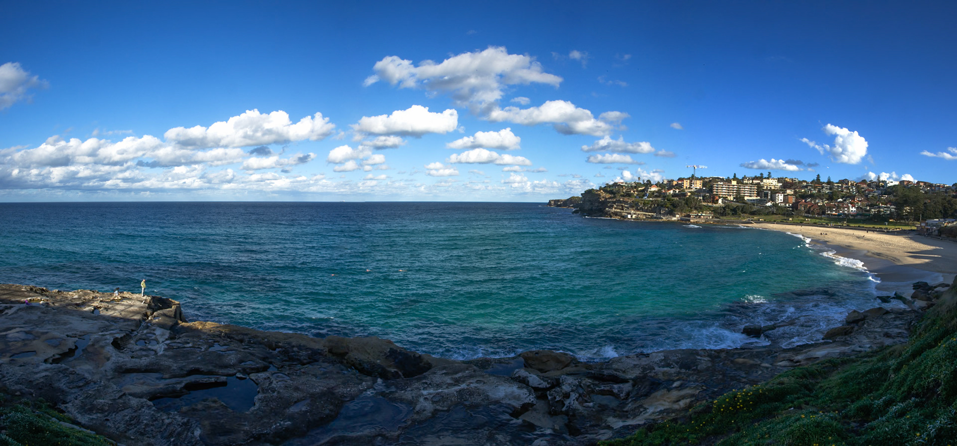 A panorama, showing fisherman, Bronte Beach, Sydney, Australia