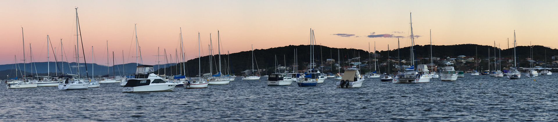Panorama of yachts  taken in the early morning at Belmont Lake Macquarie.