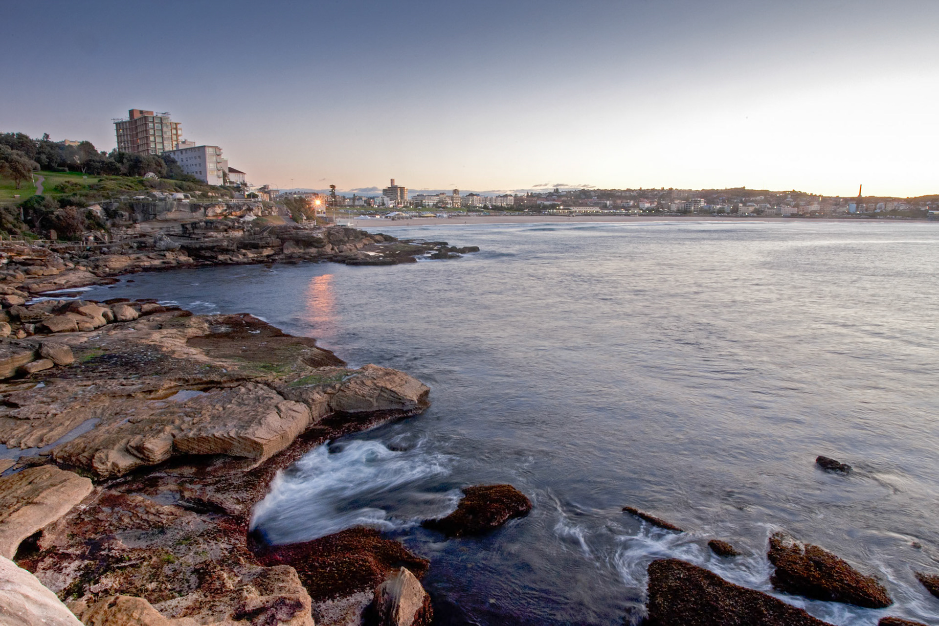 An early morning shot from the cliffs looking back to Bondi, Sydney.