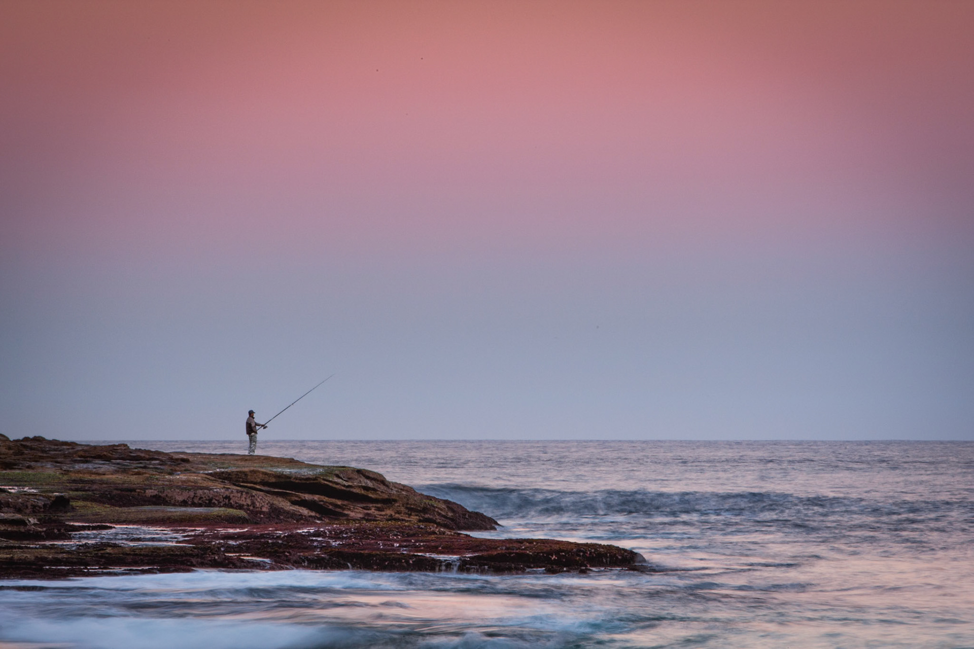 Fisherman in the late afternoon, Bronte Rocks, Sydney ,Australia