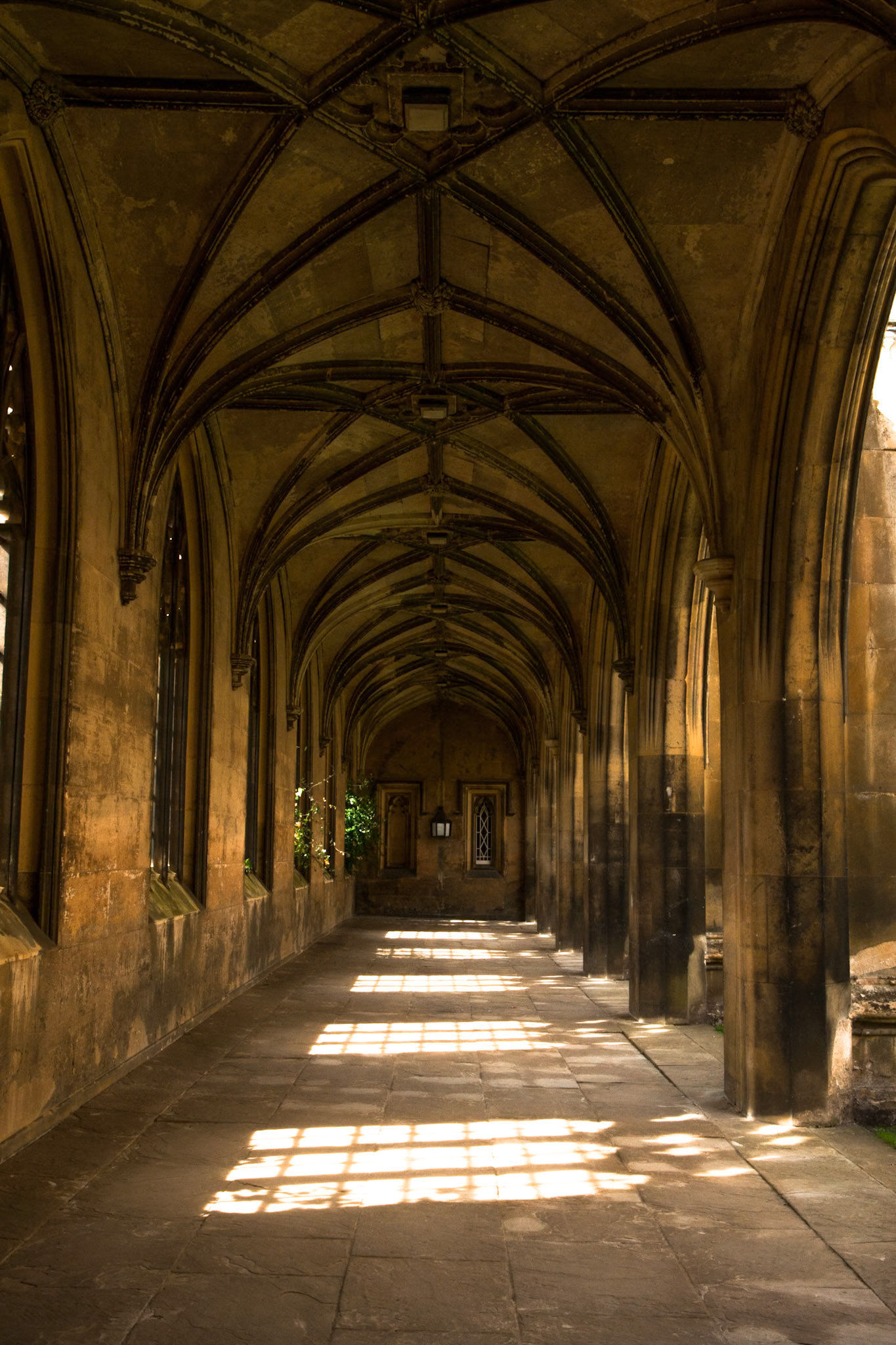 Patterns of light from the windows in the courtyard of St John's College Cambridge