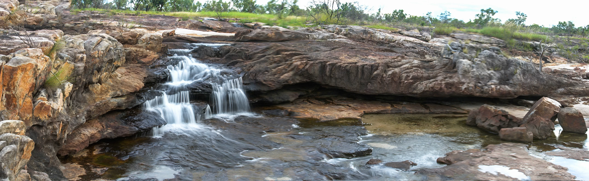 Rock-pool and waterfall. Mount Borradale, Arnhemland, Northern Territory