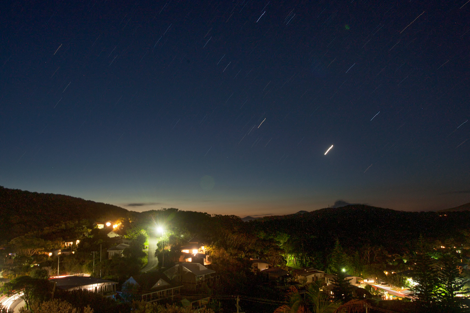A time exposure showing the stars and night sky above Bluey's Beach.