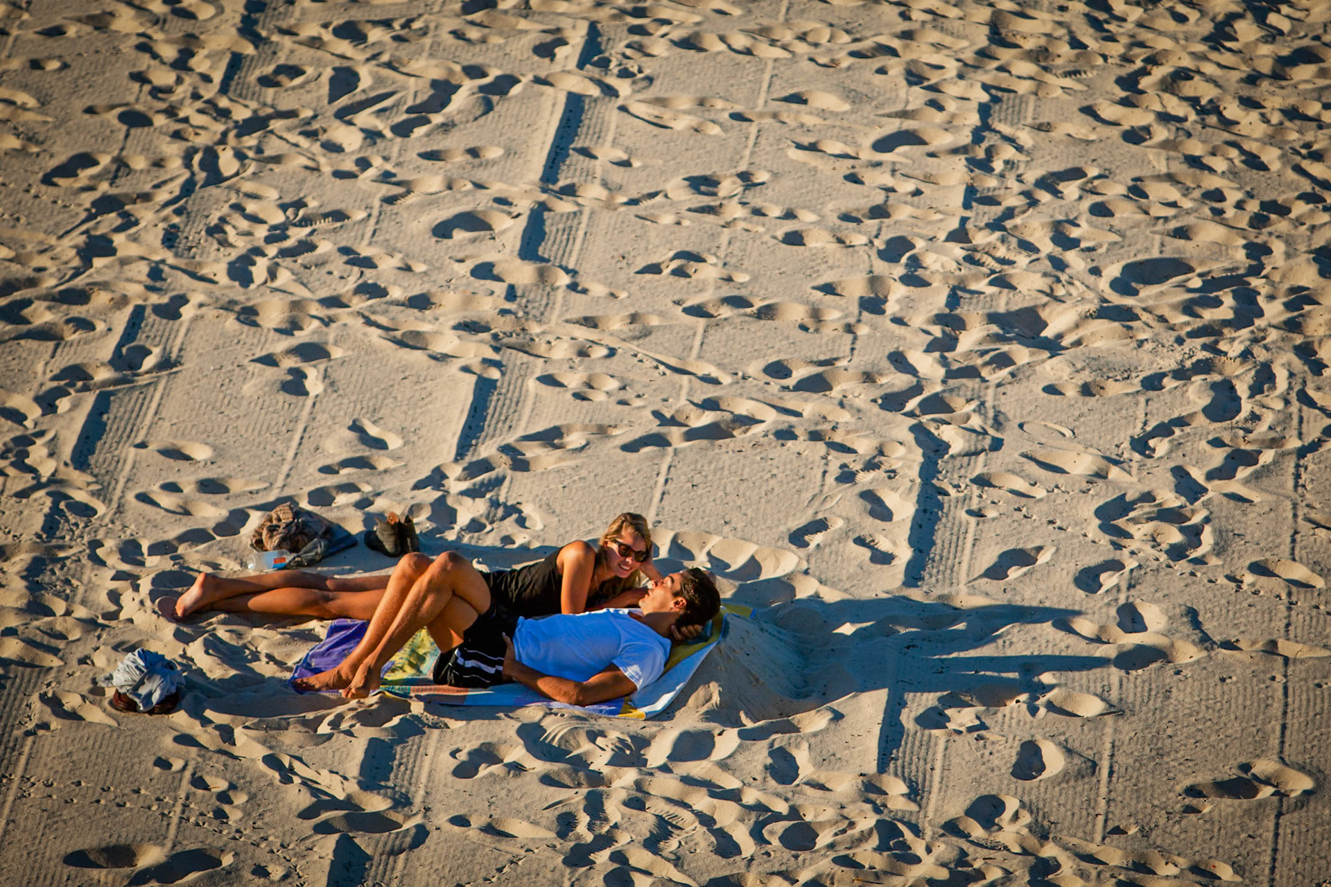 Couple on beach, Tamarama, Sydney, Australia