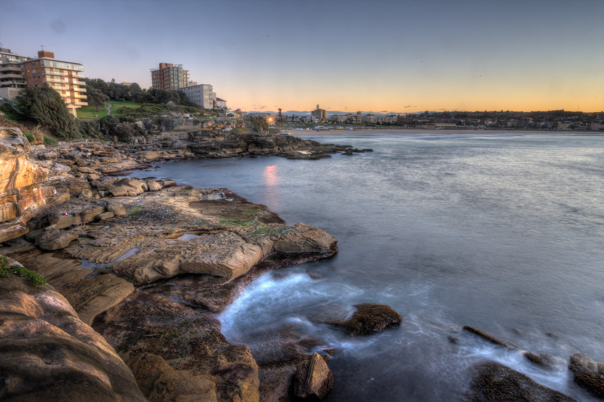 An early morning shot from the cliffs looking back to Bondi, Sydney.