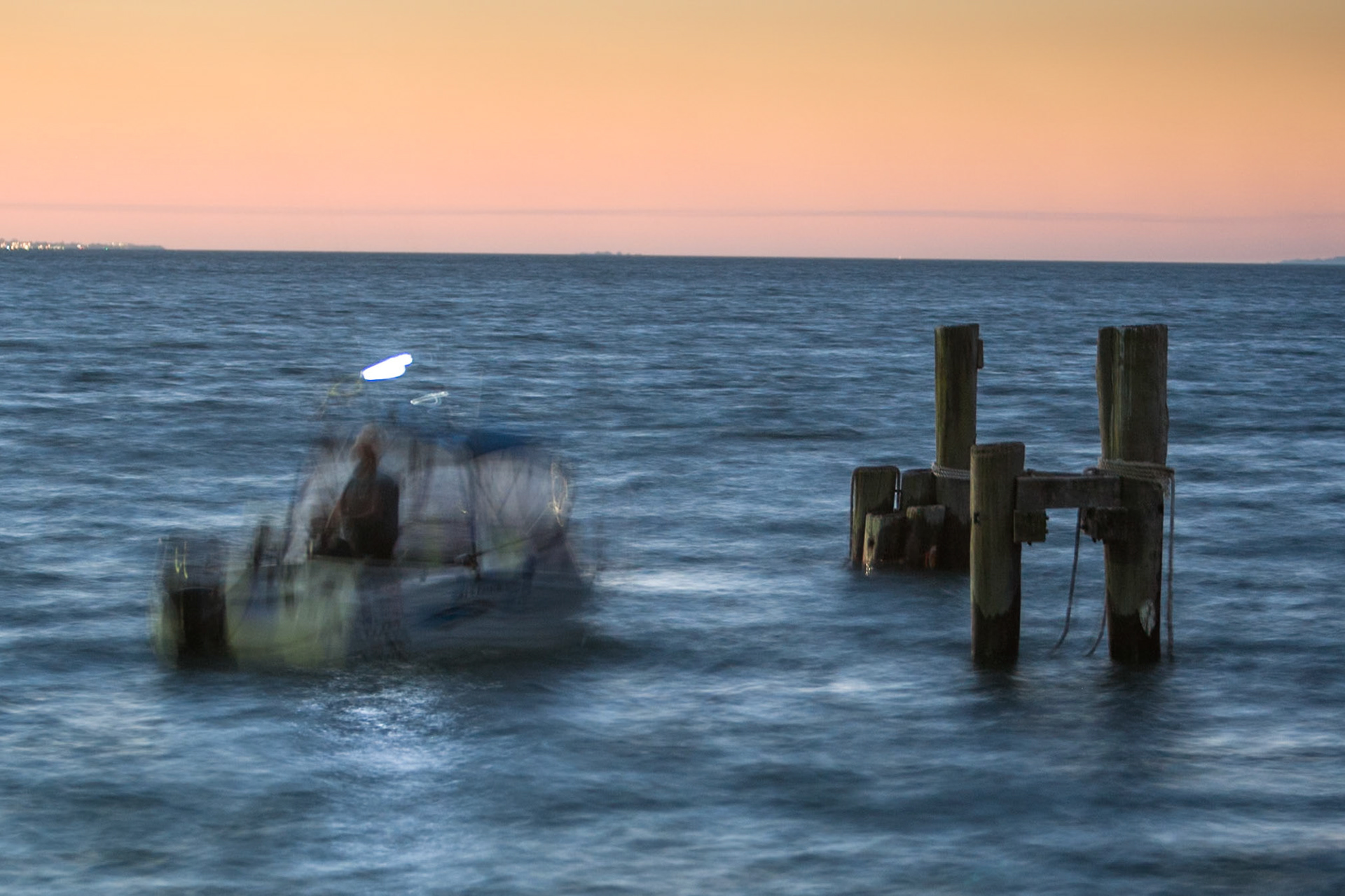 Boat at sunset, Kingfisher Bay, Queensland