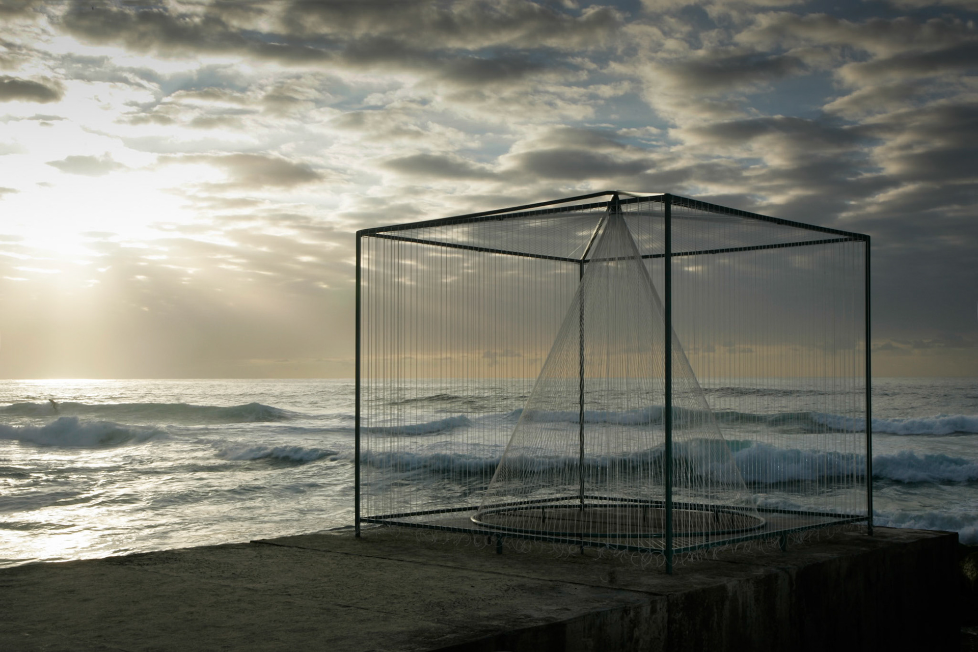 Sunrise shot of one of the exhibits of sculptures by the sea.