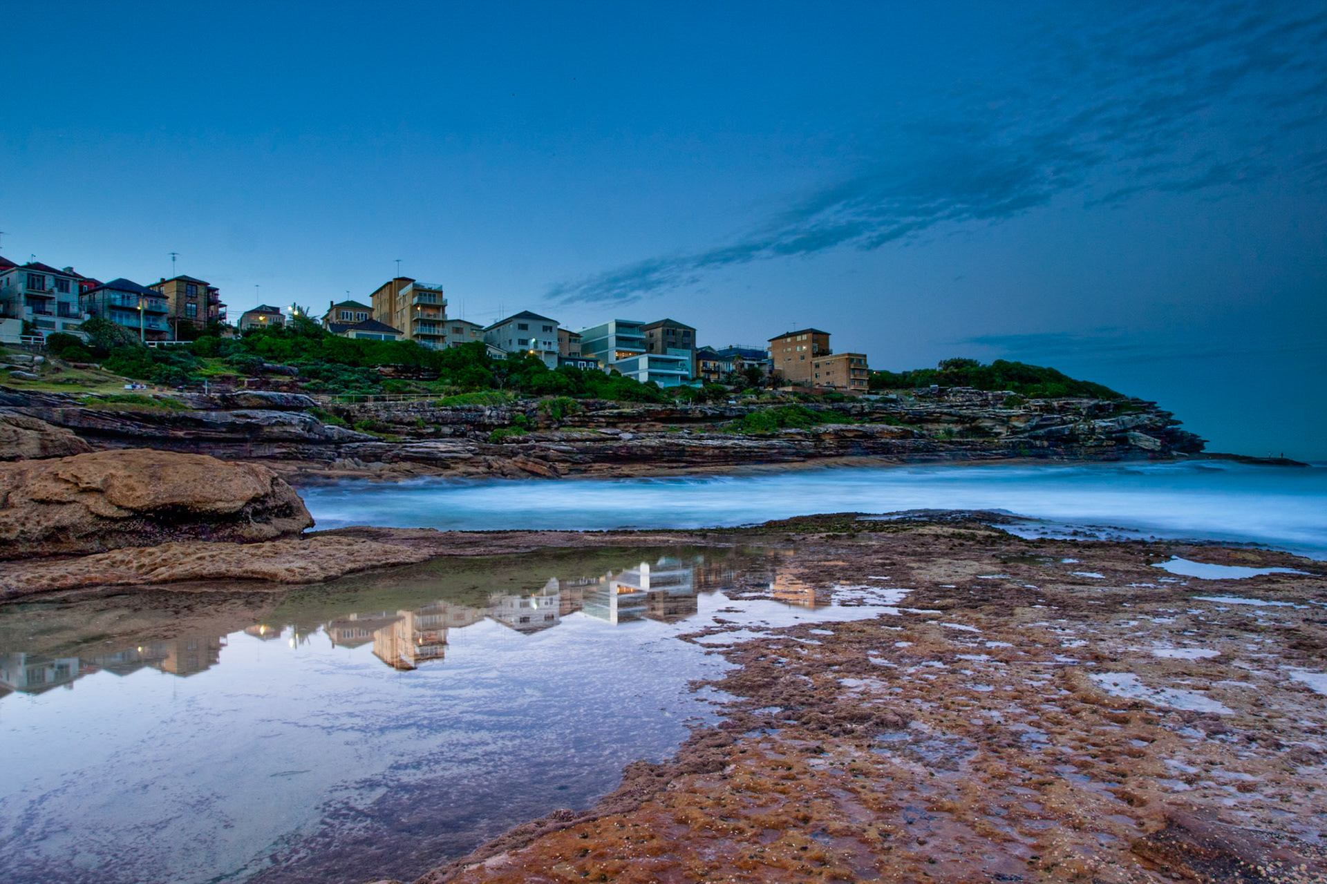 Evening view of the houses overlooking Mackenzie's Bay.