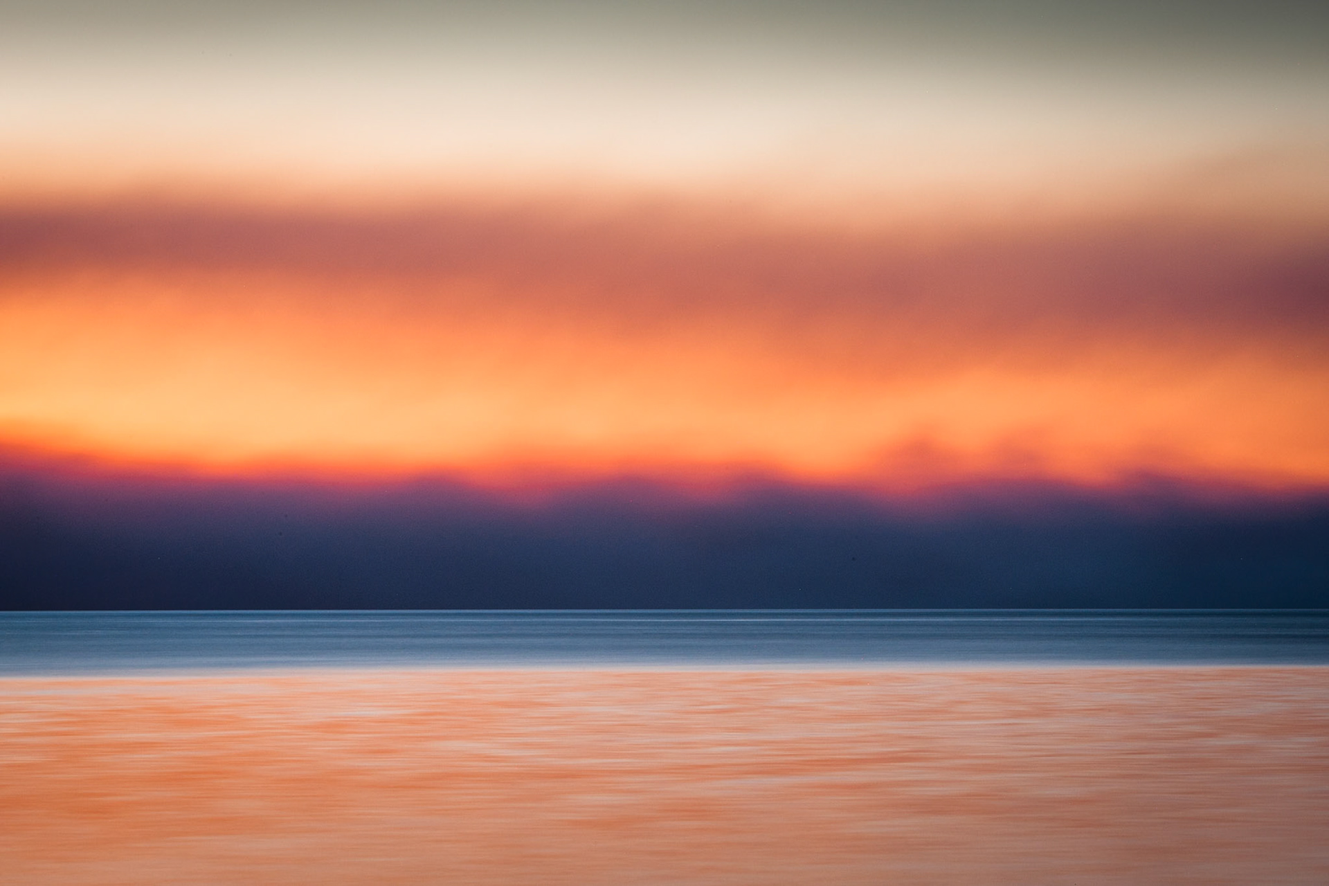 Sunset bushfire smoke on Woody Island in Hervey Bay, from Fraser Island.