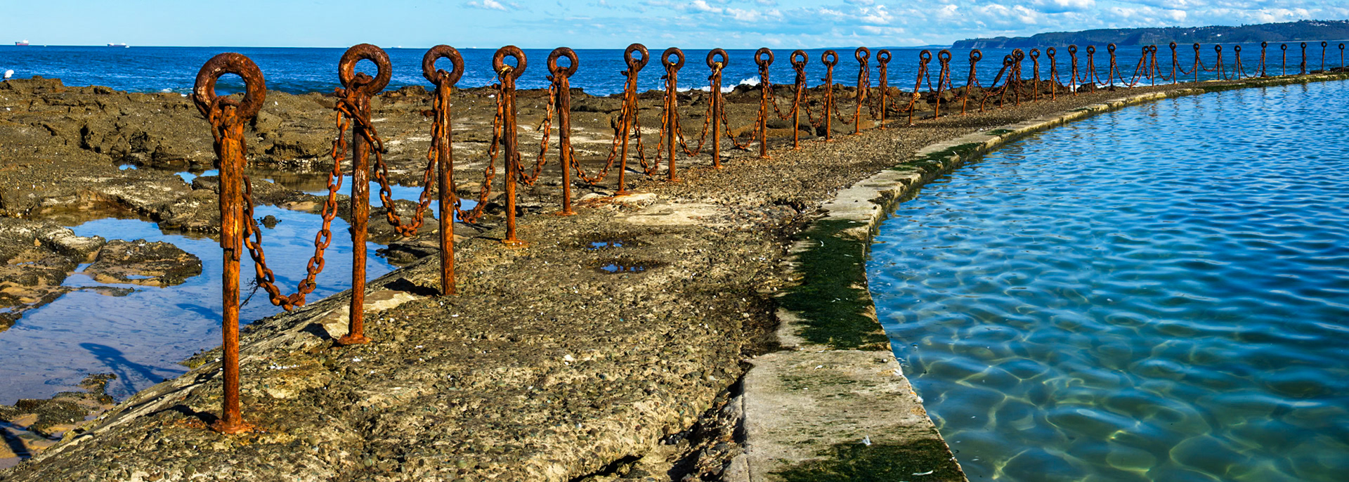 Rusty metal chain at the bogey hole, Newcastle