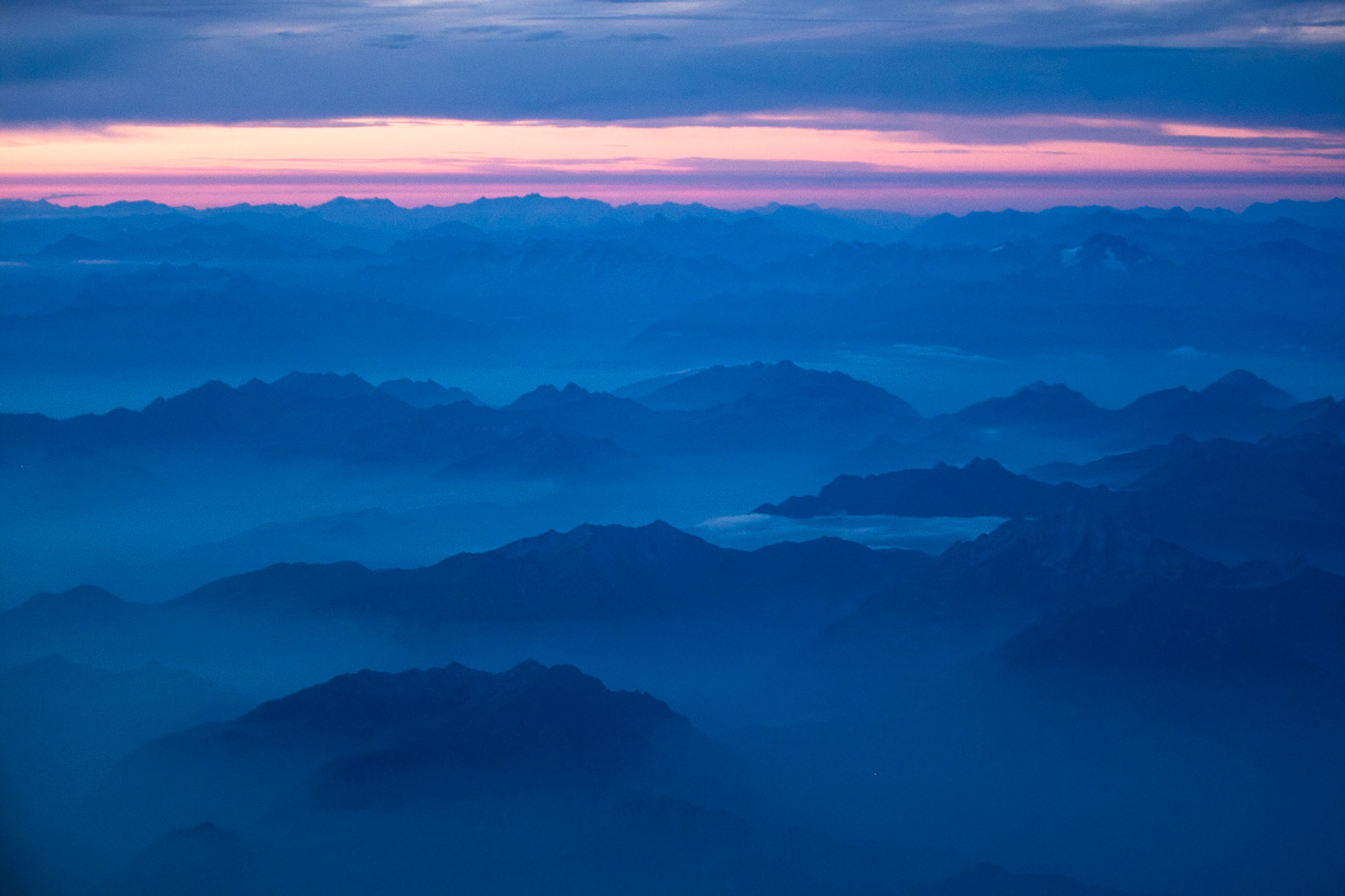 Flying home, sunset in the Alps.