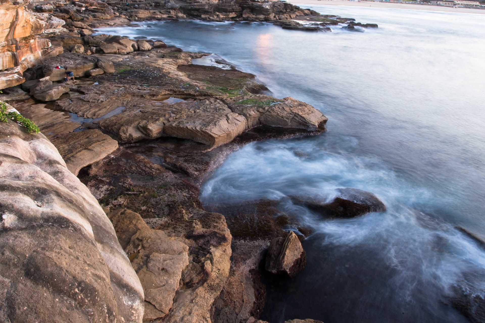 An early morning shot from the cliffs looking back to Bondi, Sydney.