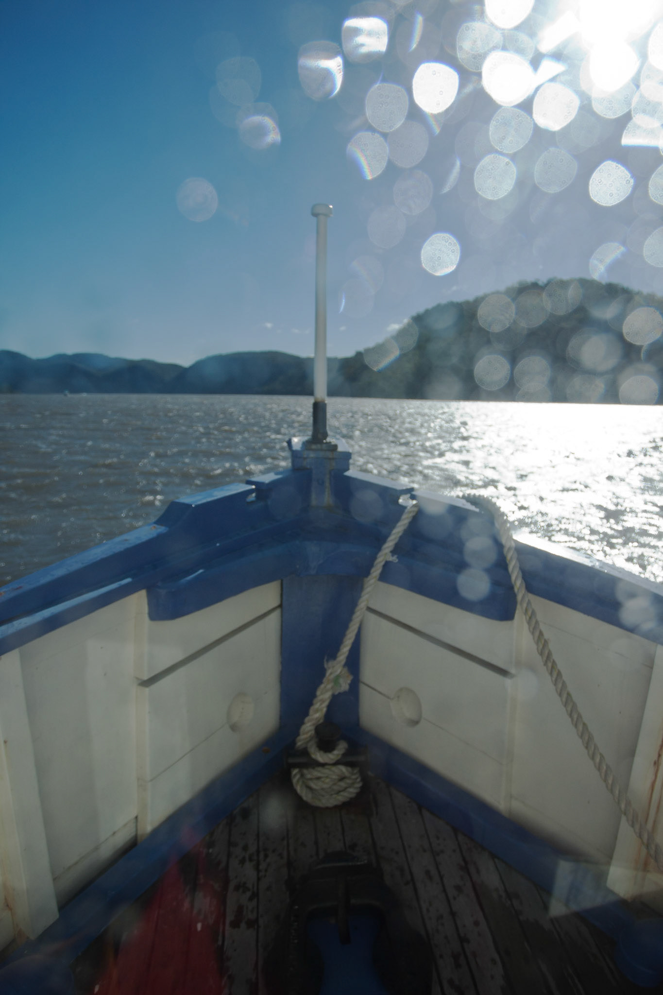 Mail delivery on the Hawksbury river, NSW. A particulalry, miserable, cold, wet grey and windy day.
