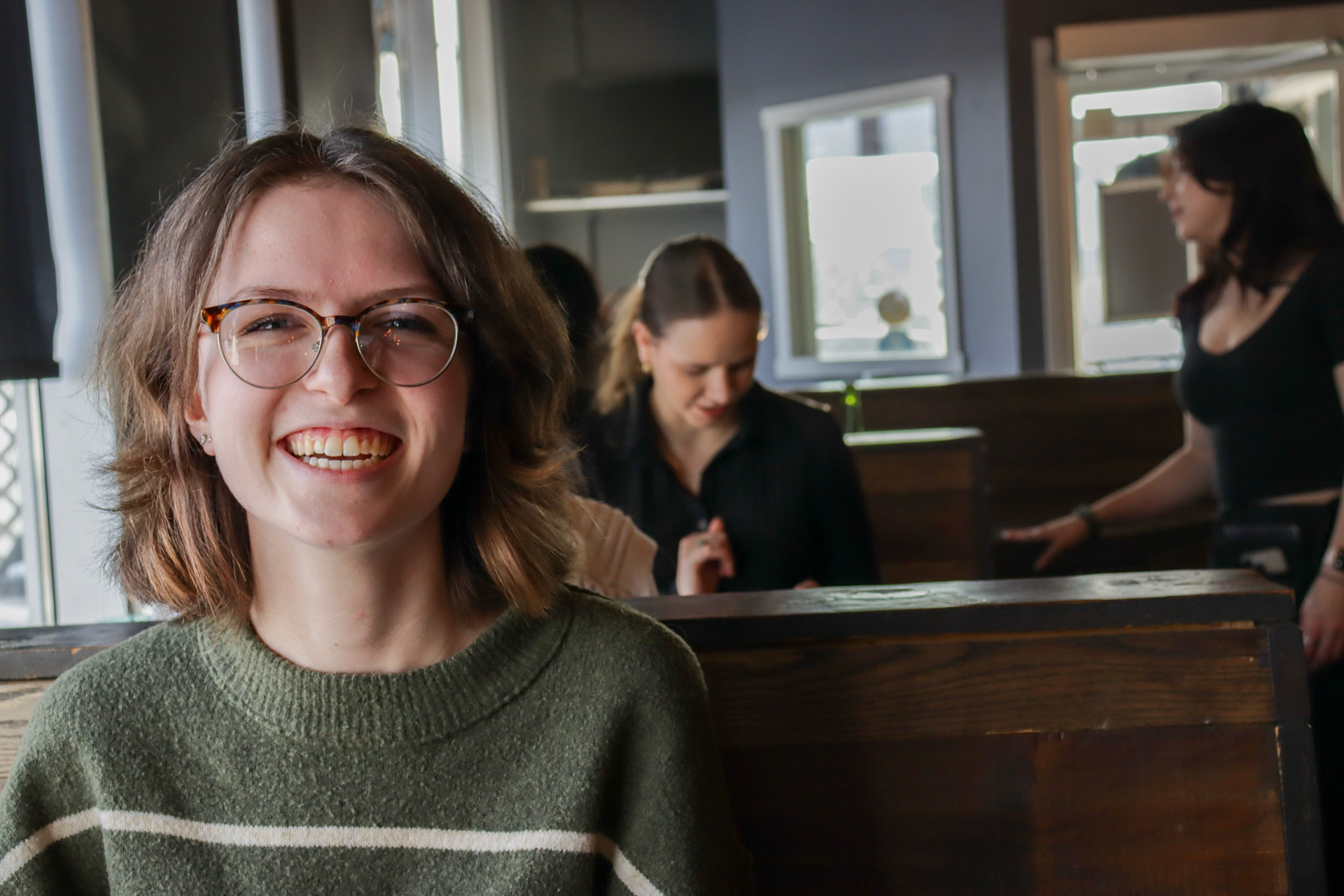 Victoria Harrison smiling through her constant endometriosis pains in her home town of Airdrie. (photo by Jenna Willox)