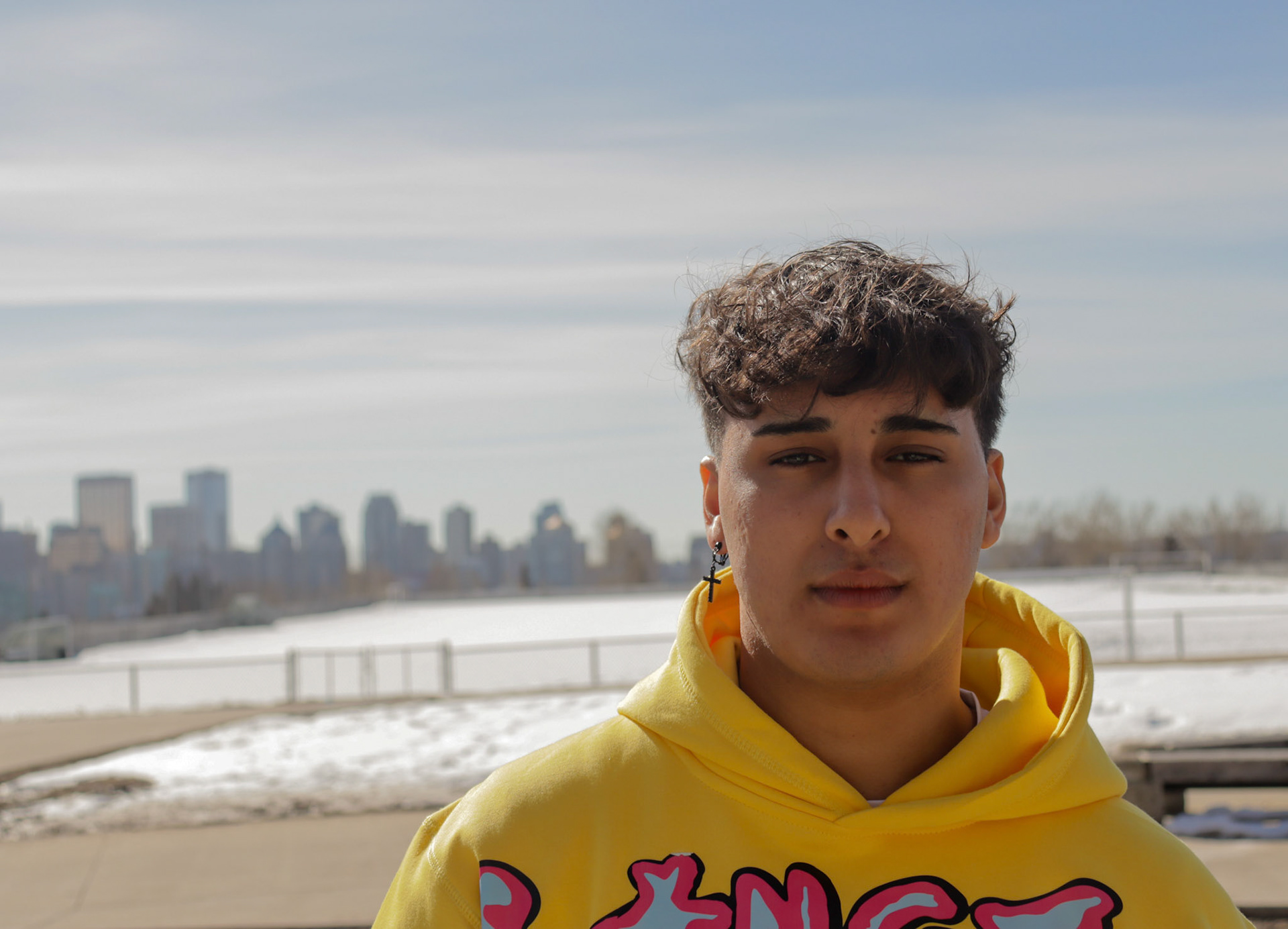SAIT Journalism student Gur Sodhi posing for a portrait in the winter of his first semester as a journalism student. (Photo by Jenna Willox)