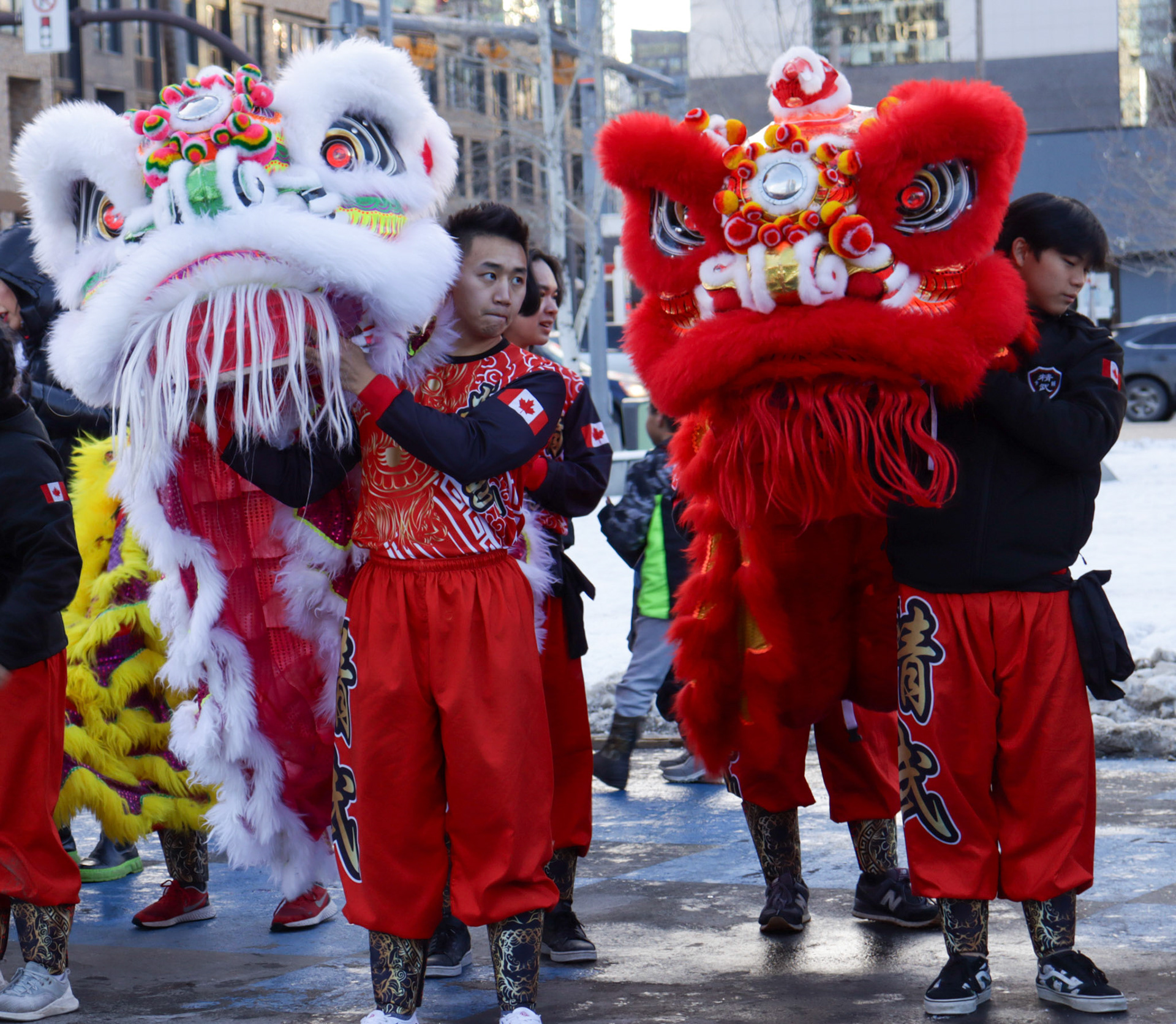 Matthew and Dawson of the Jing Wo Lion Dance Team at Pixel Park in downtown Calgary on the 2024  Lunar New Year. (Photo by Jenna Willox)