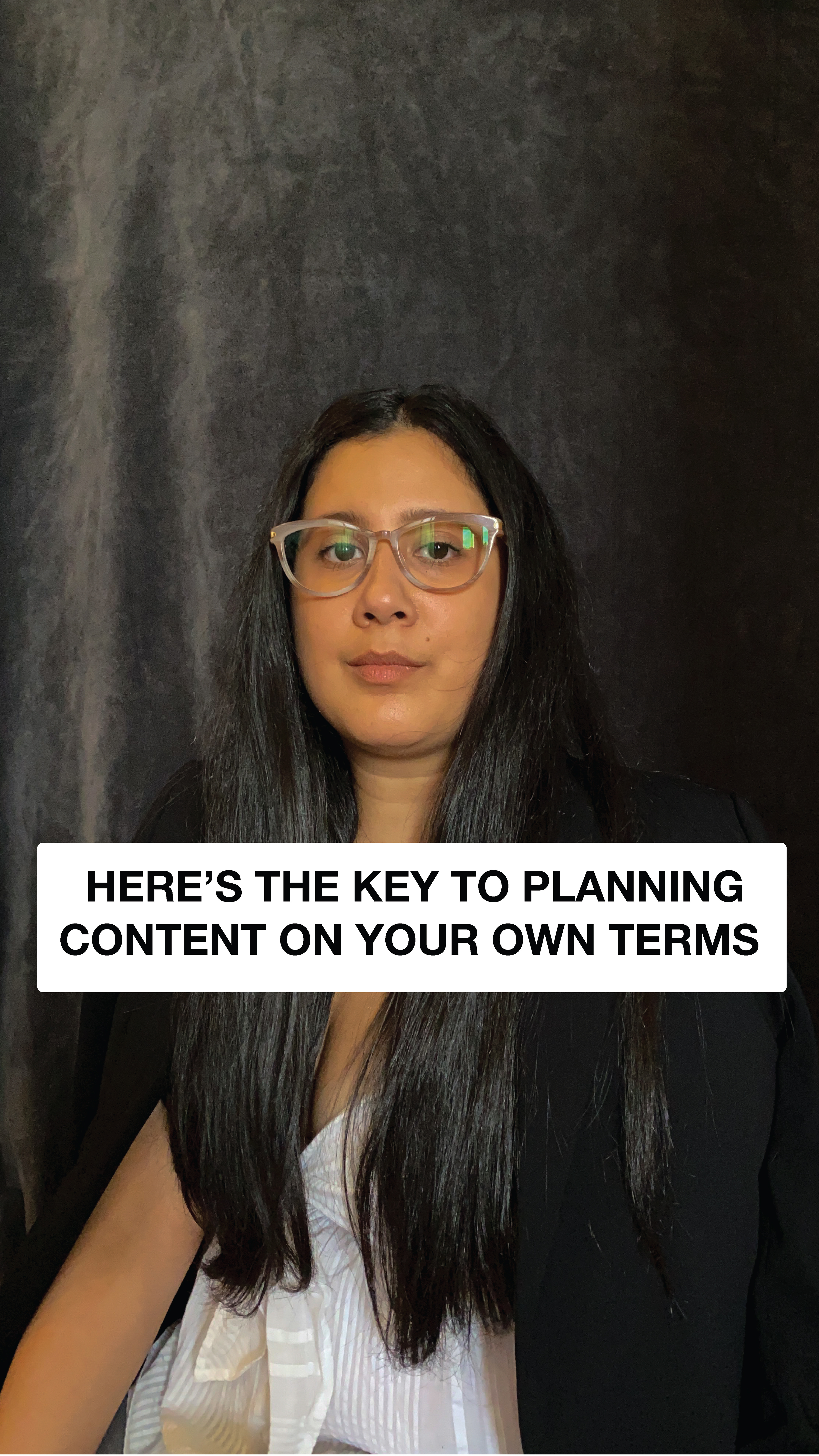 Crysbel poses for a photographer with a text in front of her stating "here's the key to planning content on your own terms".