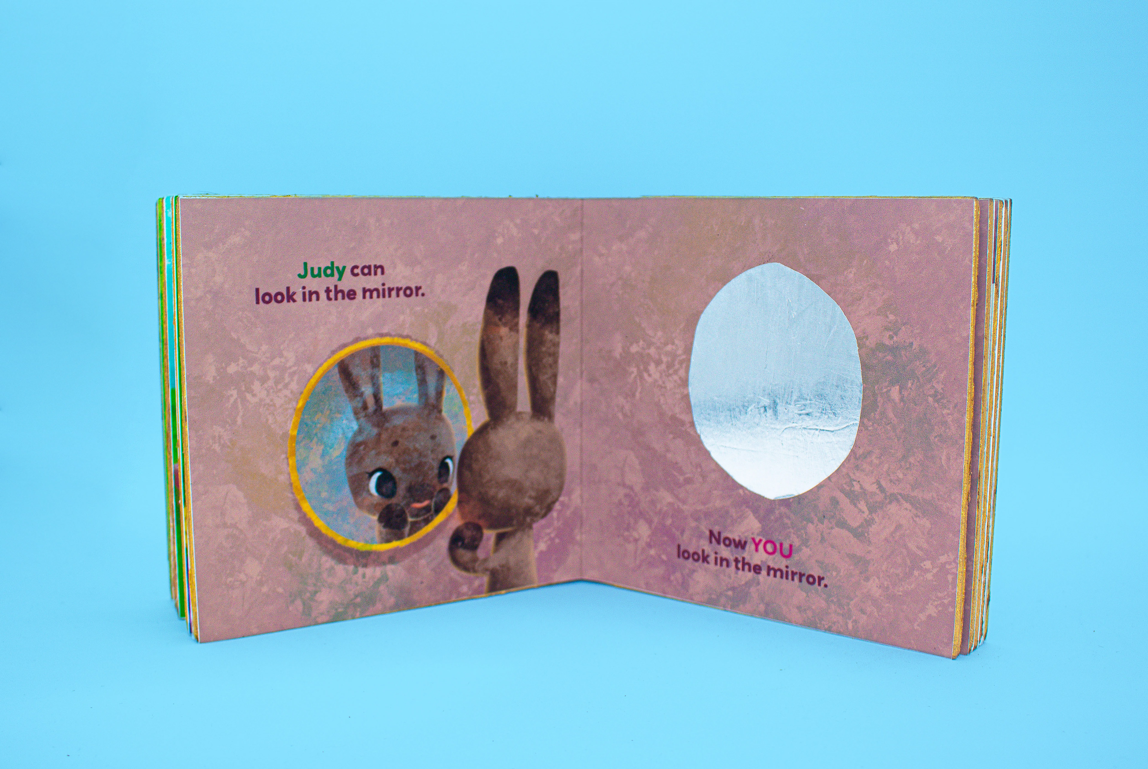 Reflective material emulates the experience of a mirror.
