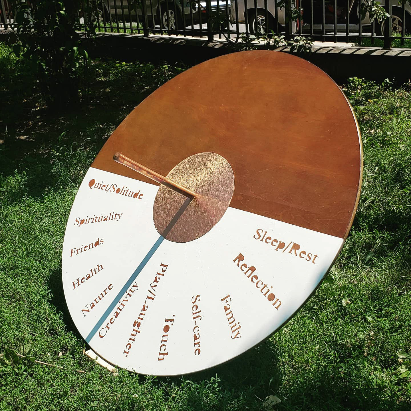 Outdoor view of the sculpture “Making Time” by artist Jason Robinson.